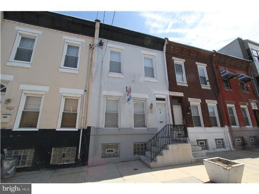 Welcome to this charming 2 story 3 bedroom 1.5 bath home in Point Breeze only a few blocks S of Federal St, American Sardine, and Breezy Cafe. This home is move in ready with features such as hard wood throughout, recessed lighting in the living and dining room, a beautiful side staircase with wooden banister, freshly painted throughout and bright white trim throughout. There is plenty of space for a formal living and dining room. The first floor has a convenient powder room with pedestal sink neatly tucked away and access to a small rear yard and basement access with Washer and Dryer. There is a brand new kitchen with granite counters and stainless appliance including a dishwasher, microwave, gas range and refrigerator. The 2nd floor has 3 bedrooms and a hall bath. The bath has cool retro tile work and a storage vanity. Central air. East to view. Visit today!