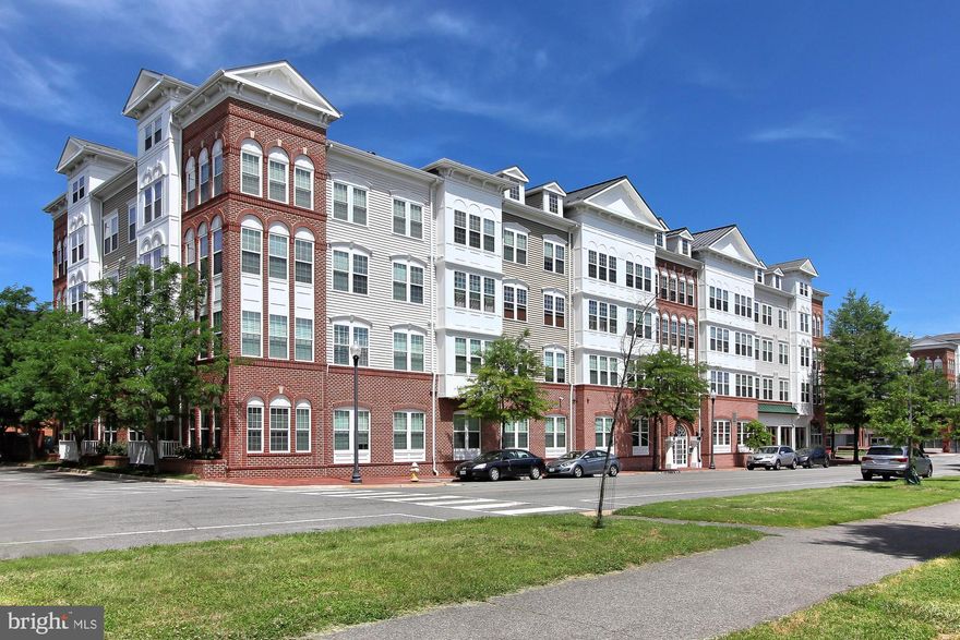 Offer Deadline Sunday 4pm      Welcome to this bright and inviting corner unit Devon model condo, boasting abundant natural light from its many windows. This charming home features two spacious bedrooms, two full baths, and the convenience of two garage parking spaces. The open living and dining areas showcase elegant hardwood floors and a cozy gas fireplace, while the kitchen impresses with white cabinetry, stainless steel appliances, and granite countertops. Designer paint enhances the space throughout. Ideally located across from Brenman Park and within close proximity to all Cameron Station amenities, this condo offers both style and convenience.