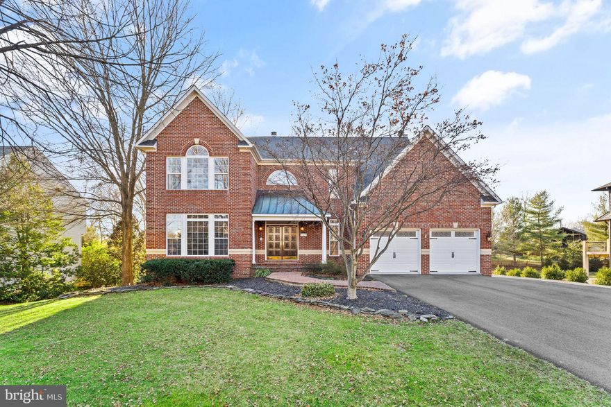 Offers being presented as received.  Welcome to this gorgeous custom home. Come in through the double carved doors into the two story entry. The wood floors throughout were redone in 2022, with the rest of this stunning level. The gourmet kitchen has 2 islands, quartz countertops, and a large breakfast room with skylights that walks out to a deck (trek) overlooking the private back yard. The smart refrigerator has an outer display with internet connection. The stove is has double oven with convection and air-fry options. There is a built in Miele expresso maker with its own waterline.  The beverage center offers additional refrigeration. Custom backsplash, range hood, instant hot, and other features are perfect for your gourmet needs.  The kitchen opens to the great room with a cozy wood burning fireplace. Formal living room, dining room (with a second fireplace), a large office with custom mahogany built ins, plus a mud room off the garage and a guest bathroom finish the level.  Upstairs, the luxurious Primary Suite has a full sitting area, 2 walk in closets, and a brand new (2023) bath. The 3 additional bedrooms all have walk-in closets, one has a private bath and the other 2  share the 3rd bathroom. This level has brand new carpet and, new sinks and faucets in the baths. The attic pull down with stairs offers additional storage shelving, and holds one of 2 HVAC systems. The lower level is made for guests and fun! A full bar, theatre screen with speaker system, gym, and bedroom walk out to the patio with a hot tub! There is a full bath and a half bath.  The utility room has the washer and dryer, which can easily be moved to the mudroom to the existing hookups. Ready for more? The 2 car garage is heated and has shelving  and epoxy flooring. The driveway was widened and repaved with an extension that leads to an EV plug and a generator plug wired to the interior.  Under the deck is a shed with concrete floor.  There is a full yard irrigation system with Bluetooth control. Every detail of the home has been meticulously thought out and maintained.  Come in and enjoy.