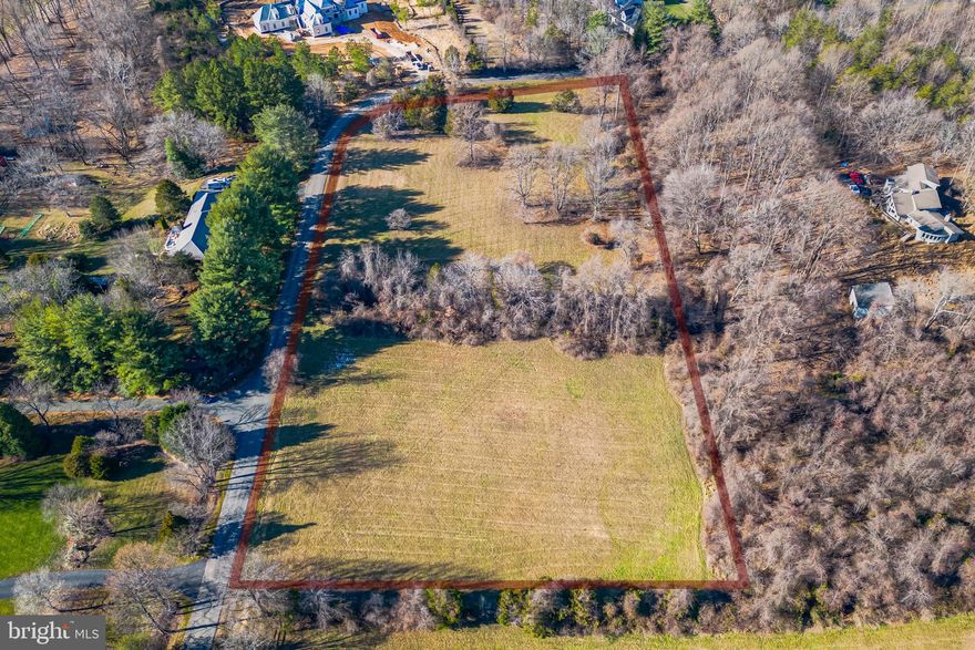 This rare find of beautiful flat, over five acres of land, where you can imagine your dream home. Surrounded by woods and beautiful homes, this property is nestled in the exclusive Woodsfield neighborhood of Great Falls, in the sought-after school district of Langley High School, ranked one of the highest in the United States. Be immersed in the natural beauty of the Virginia countryside while only minutes away from Tyson’s corner and Washington, DC.