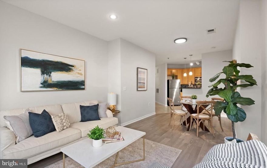 Experience luxury urban living at the The Silverton Condominium in the heart of Downtown Silver Spring—just minutes from the Washington, D.C. line and a short walk to the Silver Spring Metro, shopping, dining, entertainment, and year-round community events. This thoughtfully designed residence offers an ideal layout for shared living, featuring two spacious bedrooms positioned for privacy, each with its own full bath. This makes it perfect for roommates, guests, a home office, or flexible living arrangements while still enjoying a comfortable shared living area. Two deeded reserved garage parking spaces convey with the unit, providing exceptional convenience and value.

Residents enjoy a full-service lifestyle with 24/7 front desk service, on-site management, a pet-friendly atmosphere, an outdoor pool, fitness center, party room, dog run, landscaped courtyards, and a large outdoor plaza with seating and community activities. The building is conveniently located next to a public bus stop and just a few blocks from the Silver Spring Metro, offering easy access to everything Downtown Silver Spring has to offer, including the future Purple Line. 

The home has been meticulously maintained and protected under a home warranty for the past 10 years, with even minor repairs proactively addressed over time. The seller is willing to transfer the remainder of the home warranty term to the new owner if desired. Major systems and appliances have also been recently updated, including the refrigerator, dishwasher, washer, dryer, and water heater, offering peace of mind and move-in-ready convenience.
