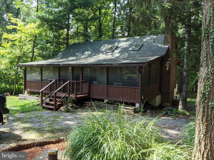****If you missed it the first time- Now is your chance! Pending release.  The buyer has been relocated for work and cannot complete the sale. Don't let this one get away! Cozy cabin in the woods with tons of privacy, wooded back yard and circular driveway.  This cabin has so many gorgeous features! Screened  in porch,  living room with fireplace, kitchen with granite and stainless steel and hickory cabinets.  Dine in kitchen, deck off of kitchen for bbqing,  2 beds and a bath complete the first floor.  Up in the loft you have tons of space to host family or use as an office, downstairs you have another bedroom and full bath,  outside entry, washer and dryer, and space for another bedroom or game room.  The woodshed and storage shed complete this gorgeous property.