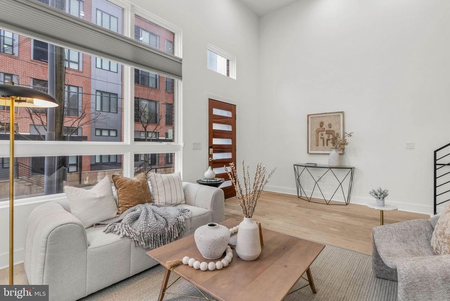 Stunning Corner Home with elevator, roof deck & two-car garage in Logan Square! Experience luxury living in this exceptional corner property, ideally located just above Rittenhouse Square in the desirable Logan Square neighborhood of Center City. Situated within the Albert M. Greenfield School catchment and just blocks from the Comcast Centers, this spacious home offers unmatched convenience and style. Enjoy breathtaking skyline views from the expansive roof deck, complete with a dry bar and refrigerator in the pilot house. A second outdoor deck is located just off the kitchen, providing additional space for relaxation and gatherings. Inside, natural light pours through oversized windows, illuminating the thoughtfully designed floor plan. Elegant, high-end finishes include wide plank hardwood floors, designer fixtures, and a chef’s kitchen featuring high end appliances, along with an oversized granite island. The two-story living room creates a dramatic focal point, while the private primary suite offers a luxurious retreat with walk-in closets and a spa-inspired bath featuring a floating tub, double vanity, and an expansive glass shower. Additional highlights include high-efficiency heating and cooling, a two-car garage, and the convenience of an in-home elevator. Walk to Rittenhouse Square, 30th Street Station, the Schuylkill River Trail, the Barnes Foundation, and more. This one-of-a-kind home offers the best of city living with top-tier amenities and unbeatable location. Taxes and square footage is the responsibility of the buyer to have verified independently.