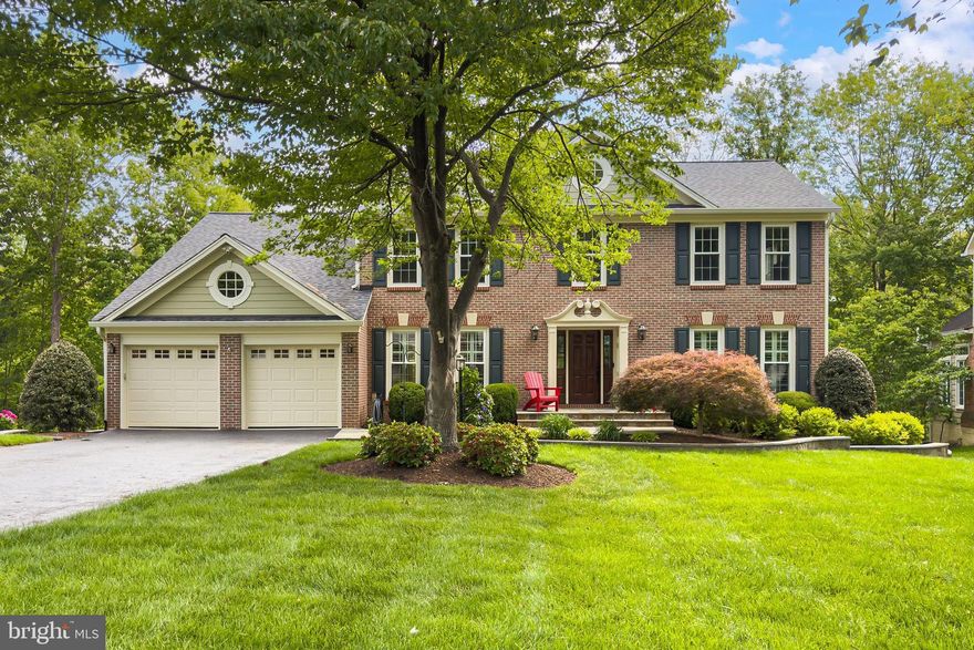 Welcome to this stunning brick-front colonial in the highly sought-after Virginia Run community, beautifully updated and completely move-in ready. Offering over 4,600 finished square feet across three levels, this exceptional home features 4 bedrooms, 4 full bathrooms, and 1 half bath. Situated near a quiet cul-de-sac backing to parkland, the property combines privacy, timeless curb appeal, and extensive upgrades throughout.

Inside, you’ll find solid hardwood floors throughout the main level, staircase, and upper landing, creating warmth and continuity throughout the home. The spacious open-concept layout features a dramatic two-story family room with a gas fireplace, formal living and dining rooms, a stylish butler’s pantry with a coffee bar, and a dedicated home office with custom built-in bookshelves.

The updated kitchen, renovated in 2017, opens seamlessly to the main living spaces and outdoor entertaining areas, including a Trex deck, slate and paver patio, a fully fenced backyard with a fire pit, and beautifully redesigned slate front walkway and front entry completed in 2023.

A beautifully updated main-level half bath features stylish floor tile and a modern vanity. Just off the kitchen, the true mud room offers built-in cubbies, laundry, and additional storage space for everyday convenience. The two-car front-load garage and long driveway provide room for all your vehicles.

Upstairs, the spacious primary suite is truly an oasis, featuring new carpeting, vaulted ceilings, and a huge walk-in closet. Completely renovated in 2021, the luxurious primary bath showcases a standalone soaking tub, glass-enclosed shower, upscale tilework, custom cabinetry, and high-end finishes throughout.

Two additional bedrooms share a beautifully updated Jack & Jill bath renovated with high-end finishes in 2021. The fourth upstairs bedroom features its own ensuite bath with a glass-enclosed shower. All secondary bedrooms offer generous closet space.

The fully finished walkout basement is filled with great natural light and features luxury vinyl plank flooring, a full bath, and multiple additional rooms ideal for a home office, workout room, guest space, or flexible living areas to suit your needs.

Additional major updates include Hardiplank siding, replacement windows and roof (2017), HVAC and hot water heater (2021), providing peace of mind for years to come.

Enjoy all that Virginia Run has to offer, including tennis and pickleball courts, basketball courts, a resort-style community pool with summer swim team, walking trails, playgrounds, and year-round community activities for all ages. Conveniently located with easy access to Rt. 66 and Rt. 28 for commuting throughout Northern Virginia and beyond.

This is the one you’ve been waiting for! Active for private showings on Thursday, May 28th. Open House Saturday, May 30th from 1:00–3:00 PM.