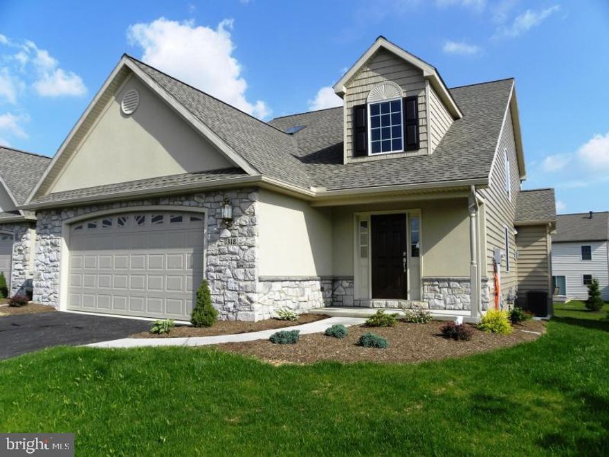FOR LIMITED TIME SELLER IS OFFERING $10,000 INCENTIVE FOR BUYER! Ask for Details. Features Grand Entrance w/18 Ft Ceilings with Loft Overlooking. Custom Eat In Kitchen w/Granite Tops & Tile Floor. Bright Sunroom w/ Large Windows Leading to Deck. Hardwood Floors & Gas Fireplace in Living Room. 1st Floor Master Bedroom w/ Walk-in Closet & Laundry. Poured Concrete Walkout Basement. Exterior Maintenance Package for Community.