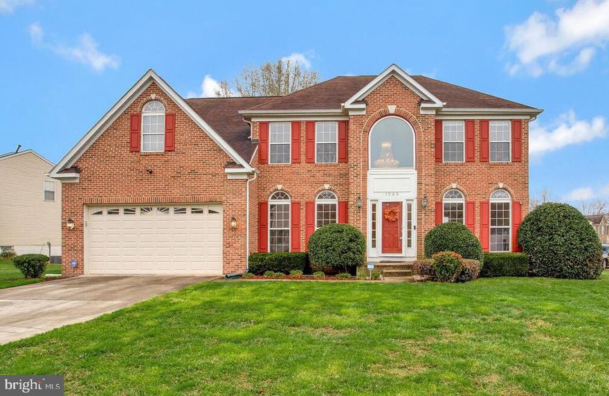 VA Assumable Loan 3% Interest Rate Stunning Brick Colonial Home located in desirable Simmons Acres Community. Large 4,824 sq ft - with 4 Bedrooms & 3.5 Bathrooms.  The two-story Entry features a Beautiful Chandelier, Gleaming Hardwood Flooring and large Transom Window that lets the natural light pour in.  Entire House Freshly Painted and NEW Carpeting on Main Level, Staircase and Catwalk.  Traditional Floor Plan Has Sitting Room & Dining Room with floor to ceiling Windows.  Large 2 level family room with Vaulted Ceiling and wall of windows also features a Gas Fireplace.  Step right into the Oversized Kitchen with Island and Breakfast Nook leading to Deck, perfect for Cookouts and relaxing quiet evenings.  Kitchen has a perfect Island for Entertaining while preparing meals on the Island Cook Top and Double Wall Oven.  Lots of Kitchen Storage with the Walk in Pantry and tons of Cabinets allows you to Easily access everything you need.  Main Level also provides a large Office tucked off of the Living Room.  The  Upper Level's Primary Bedroom with a walk in closet and its own Bathroom with a garden soaking tub and separate shower.  There are 3 additional Spacious bedrooms.  Large Basement is amazing featuring a  Theater Room, Game Room / Bar, Work Out Room a 3rd Full Bathroom and Unfinished area for a workshop and extra storage space. 2 Car Garage and Plenty of Parking space in the driveway.  Enjoy the Community Amenities - Outdoor Pool, Tennis Courts & Tot Lots.  Close to Amazing Entertainment - National Golf Club, National Harbor, MGM, Tanger Outlets, many restaurants, shops and Marinas.  Easy commute to Andrews Joint Air Force Base, Arlington VA and Washington DC.