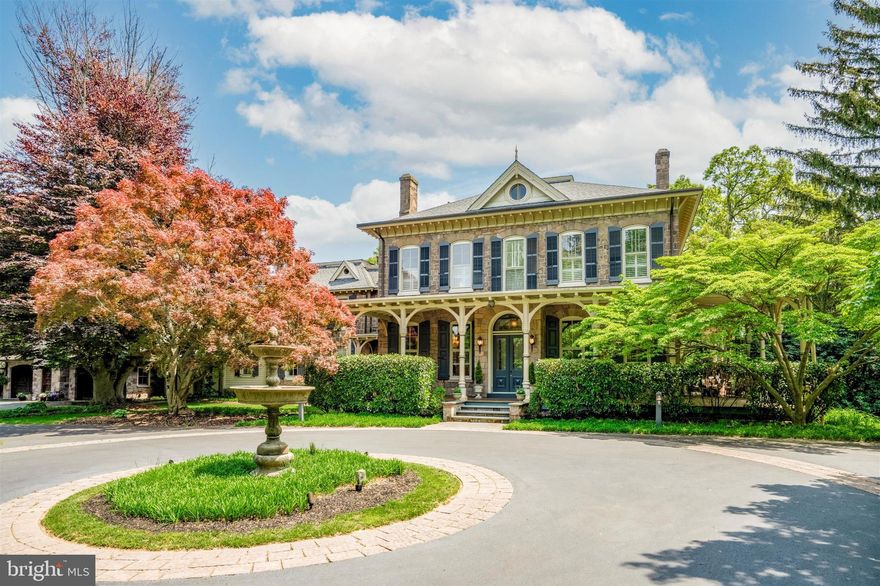 The historically significant mid-19th century John C. Mercer mansion, perched on the highest point in Whitpain Township, sits on over 6 magnificent acres adjacent to General Washington’s Camp Woods. From the moment you arrive in the circular driveway with center fountain, you are transported back to a gentler time. The beautiful stone exterior with massive wrap-around covered mahogany porch is representative of the architectural style and level of irreplaceable craftsmanship featured throughout this home. The grand marble entry foyer, soaring ceilings, floor-to-ceiling arched windows, bespoke millwork, hardwood and stone flooring, elegant chandeliers and 9 exquisite marble fireplaces are reminiscent of days gone by.

Gracefully blending old world charm with modern amenities, the chef in the family will not be disappointed. The stunningly renovated kitchen features a large center island, marble countertops, top-of-the-line appliances, including a 48” Wolf range, beautiful marble gas fireplace and tons of natural light. The formal living room, formal dining room, family room and rear access to the wrap-around deck allow you to entertain in style with convenient access to the kitchen and exceptional flow. The layout of the home, large wrap around porch and ample grounds lend themselves equally well to intimate gatherings and entertaining on a grand scale. To the left of the main entrance is an additional sitting room/home office with a marble fireplace and custom built-ins. The sun-lit "Orangerie" (a sunroom designed to protect citrus trees in the winter) could easily serve as an art studio, reading room or another sitting area featuring radiant floor heating and stunning views of the night sky and the in-ground pool, spa and spacious private grounds.  The primary bedroom suite features hardwood flooring,  wood-burning fireplace, plantation shutters, walk-in closet and a stunning primary bath with fireplace and radiant floor heat.  A beautifully tiled breezeway, with convenient pass-through access from the front of the home to the pool, leads from the main house to the annex, designed by renowned architect Rene Hoffman. It features a 3-car heated garage with 220v service for EV charging, pool bath with shower and changing room and a private upstairs in-law/au pair/guest suite. The suite includes a large open living space with cathedral ceilings and full kitchen leading to a superbly positioned private covered porch. A spacious bedroom with large closets and full bath complete the suite. With 6 spacious bedrooms and 6.2 renovated baths, you will have ample room for both family and friends.

Meander out to the back of this meticulously maintained property and enjoy the peace and solitude of exceptional privacy while relaxing by the large swimming pool, spa and gazebo. Gather for meals on the back deck or simply enjoy the view from the porch swing.   A horse lovers paradise,  this property features  pastureland situated near horse trails connecting to miles of beautiful woodlands! There is already an approved building envelope situated toward the rear of the property for a horse barn.  A world away while only a stone's throw to local restaurants, shopping and quick access to all major highways and Fort Washington and Ambler train stations. Germantown Academy is only 6 minutes away. Wissahickon Blue Ribbon schools.