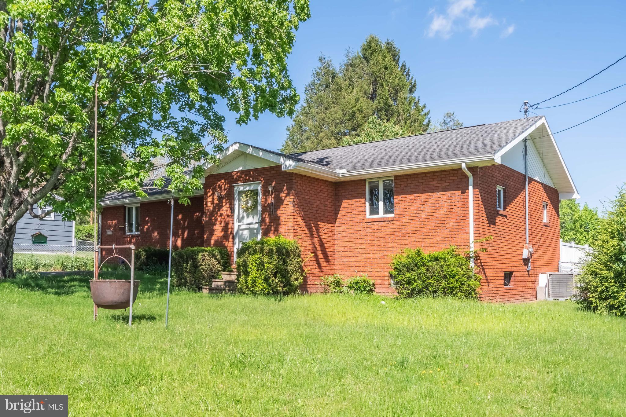 Well maintained brick rancher located in the heart of Oakland. This home offers a large kitchen open to the living room with a built-in fireplace, separate dining room, and new carpet through out. The basement is very clean, offering a clean slate for whatever you would like to do. The rear covered porch, deck and fenced in yard makes a great space to enjoy family and friends. The location is just minutes to grocery stores, schools, shopping and restaurants. Additional six town lots with a garage located just across the street are also available to purchase for $85,000. This home won't last long, call today to preview!
