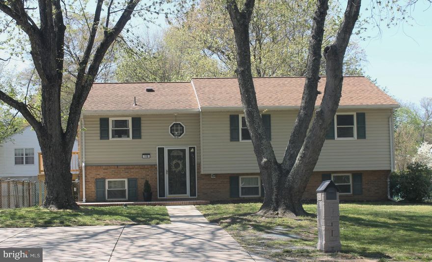 Property back on the market after two weeks.  Buyer financing fell through.  Home is "Move-In" Condition.  Family and friends will not have to search Google or check GPS to find your home.  Nor will you have to shovel mounds of snow in order to get to a cleared roadway.  This graceful split-level sits admirably with its view directly from Burns Crossing Road in Severn.  Gleaming hardwood flooring.  Dazzling and updated kitchen and dining area.  View of the spacious, level backyard from the comfy second floor living room window.  Three (3) bedrooms and full bathroom on the second floor level as well.  Guest bedroom and full bathroom on the lower level in addition to an exercise room or second bedroom lower level.  Plenty of room in the lower level to entertain or simply cuddle up to a romantic novel in front of the fireplace.  Located minutes from Fort Meade and BWI Airport.  Great location!  Make an appointment with us today to view this home.