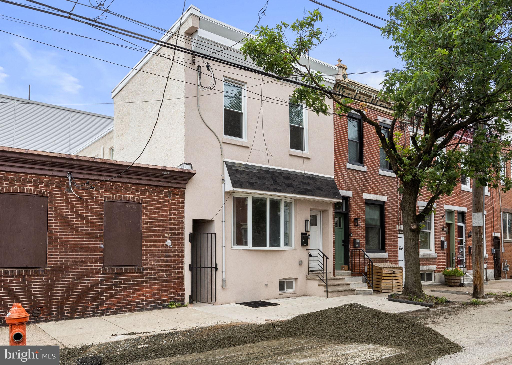 Renovated 3-Bedroom Townhome in Fishtown with Finished Basement, Balcony, and Outdoor Space | Adaire Catchment | 19125
Welcome to 1218 E Berks Street, a fully renovated 3-bedroom, 3-bathroom townhome in the heart of Fishtown, Philadelphia. Situated on a wide 18-foot lot in the highly desirable 19125 zip code and within the Adaire Elementary School catchment, this move-in ready home offers over 2,400 square feet of living space, a finished basement, private balcony, and outdoor patio.
The main level features an open floor plan with bamboo flooring, recessed lighting, and excellent natural light. The modern kitchen includes quartz countertops, white cabinetry, and stainless steel appliances, flowing directly into the dining and living areas.
Upstairs, find three spacious bedrooms and two full bathrooms. The rear bedroom includes access to a private balcony, perfect for enjoying morning coffee or relaxing in the evening. The finished basement provides valuable flex space with a third full bathroom, ideal for a guest suite, home office, gym, or media room.
The rear patio offers a private outdoor area for grilling, gardening, or entertaining. Thanks to the home's corner positioning at street level and extra windows above the garage next door, the second and third floors receive abundant natural light from multiple exposures.
Fully renovated in 2023 with brand-new HVAC, plumbing, electrical, and windows, this Fishtown home offers low-maintenance, turnkey living. Enjoy walkable access to top neighborhood favorites including Kraftwork, Loco Pez, ReAnimator Coffee, Interstate Drafthouse, and Cedar Point.
1218 E Berks Street combines modern design, generous living space, and a prime location in one of Philadelphia’s most popular and fastest-growing neighborhoods.