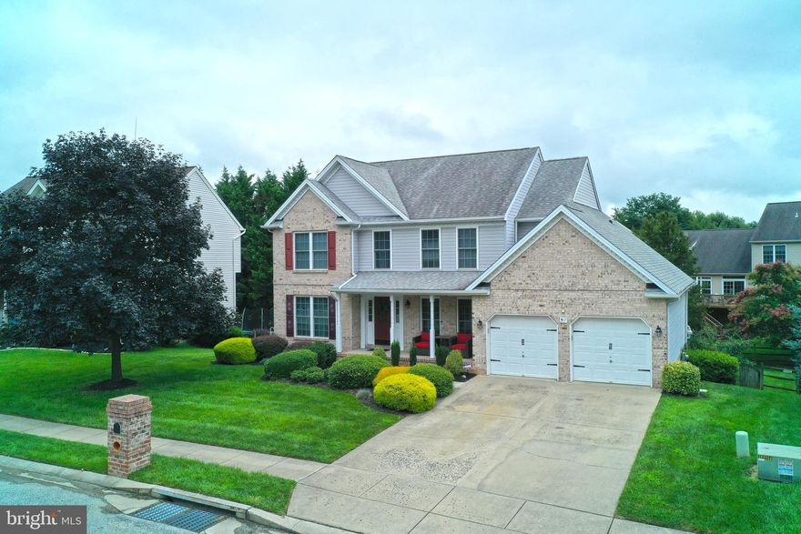 Introducing a stunning Colonial at 317 Streett Circle in the desirable Spenceola Farm neighborhood of Forest Hill, Maryland. With over 4,000 square feet of luxuriously finished living space, this home offers modern elegance and unparalleled craftsmanship. This 4-bedroom, 3 1/2 bath home features beautiful hardwood floors throughout the main level. A spacious, open-plan kitchen is a chef's delight, boasting an oversized island, stainless steel appliances, granite countertops, and an abundance of storage. A versatile room off the kitchen serves as an office or potential additional bedroom, offering flexibility for your needs. Entertain guests or relax with family in the finished basement, equipped with a stylish bar and walkout access to the fenced backyard. The dual-zone AC ensures year-round comfort. A second unit in the attic was added in 2018. The 2-car garage offers ample space for parking and storage, and the excellent location in a sought-after community makes this property a must-see. Experience the blend of convenience and comfort in this Forest Hill gem. Schedule your viewing today!