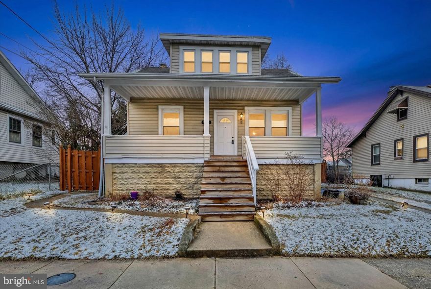 Welcome to 4609 Asbury Avenue — a charming and beautifully updated bungalow offering classic character, modern updates, and flexible living space in a convenient Baltimore location. The welcoming covered front porch creates the perfect first impression and leads into a bright, open main level with hardwood floors, while spacious living and sitting areas flow seamlessly together, creating comfortable everyday living and great space for entertaining.

An updated kitchen features white cabinetry, stainless steel appliances, stylish mosaic backsplash, tile flooring, and a center island with seating, offering both functionality and modern appeal. Large windows surround the kitchen and dining area, adding abundant natural light. The home offers well sized bedrooms and an updated full bath, providing comfortable private living spaces. A finished lower level adds valuable additional living space and flexibility — perfect for a recreation room, home office, gym, or guest area — and includes a convenient half bath. The lower level also provides a separate utility and laundry area with additional storage.

A fully fenced yard, off-street parking potential and a covered front porch creates a great spot to relax and enjoy the neighborhood. Conveniently located near shopping, dining, parks, and major commuter routes, this move-in ready home combines charm, updates, and versatile living space.

A wonderful opportunity to own a thoughtfully updated home with space, charm, and convenience.
