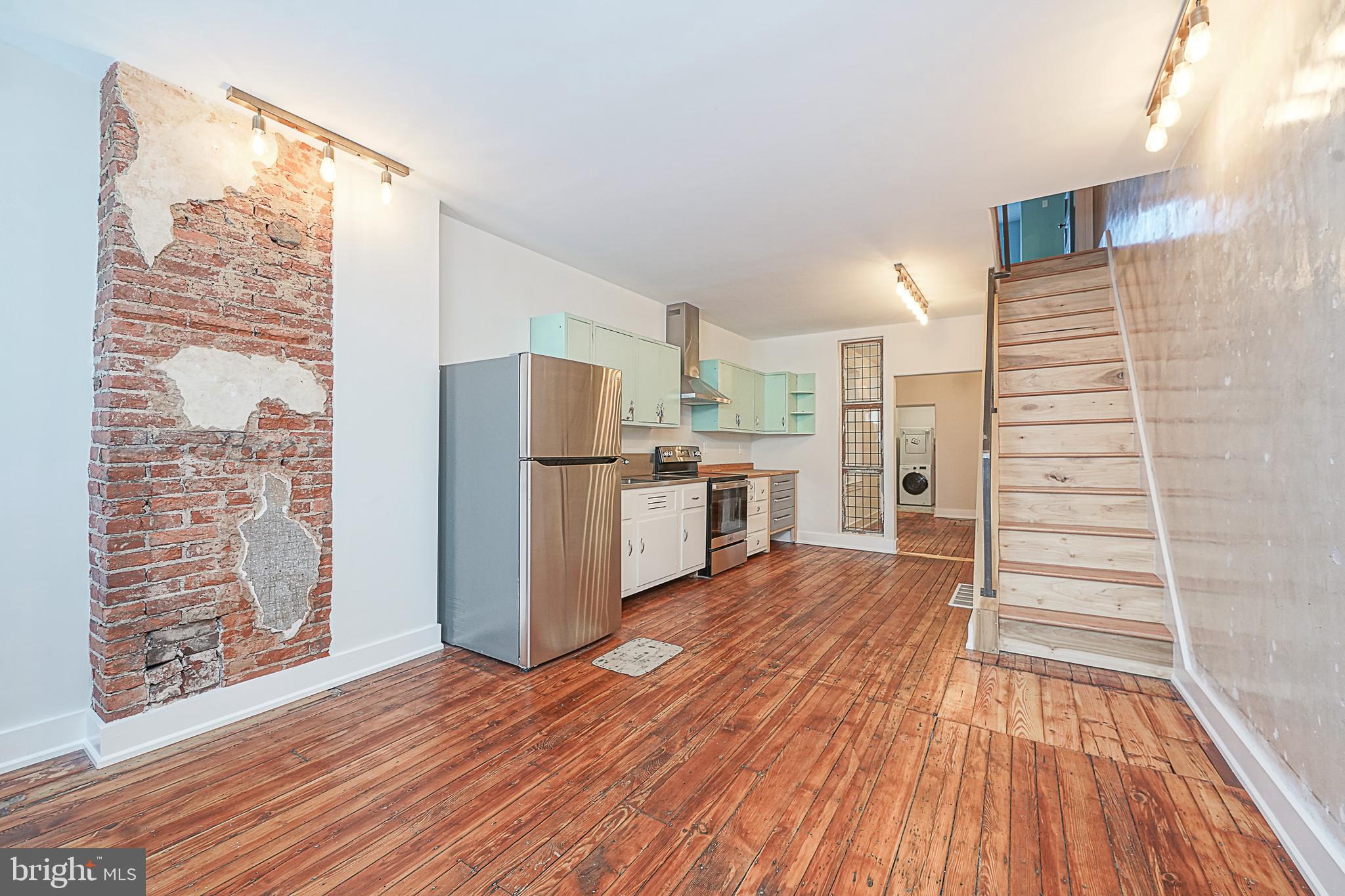 Masterfully & impeccably renovated while maintaining the original character and details! You don't want to miss this one of a kind 3 bedroom/2.5 bathroom home in Norris Square. Upon entering, you'll notice the beautiful original restored hardwood floors, tons of natural light and unique details all throughout the home. The kitchen with dining area that leads back into the living or dining area with powder room is perfect for entertaining. On the second floor, there are two well appointed bedrooms with closets and a stylish bathroom. Up on the third floor is the primary bedroom with an ultra-lux bathroom. All of the doors and trim throughout the home are original & reclaimed from a convent. This home is complete with a washer/dryer in the mudroom and a basement for extra storage and space. Located across the street from Viziata Pizza and only blocks to more cafes, Monarch Yoga, bars, restaurants, Norris Square Park and public transportation.