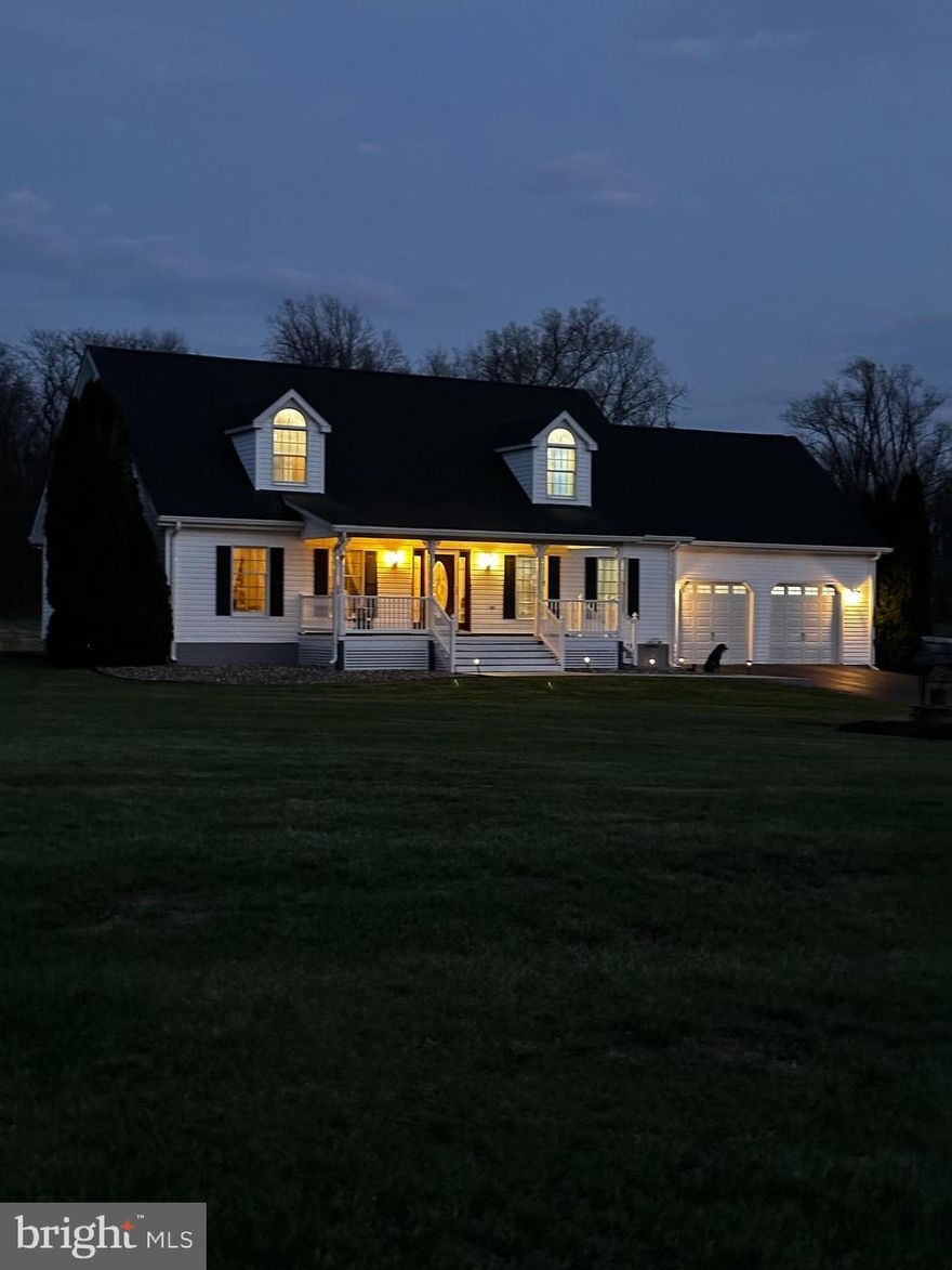 Nestled on a 2 acre rurual lot overlooking a small apple orchard, this stunning Cape Cod-style residence offers an exceptional blend of comfort, style and modern convenience. This meticulously maintained home boasts 4 spacious bedrooms and 3.5 bathrooms, providing ample space for relaxation and entertainment. Step inside to discover a thoughtfully designed interior that exudes a warm relaxing atmosphere. The traditional floor plan features luxury vinyl plank and engineered wood flooring, creating a seamless flow throughout the main living areas. The main level family room (opening to the separate pool table/game room) provides the perfect atmosphere to just kick back and relax at the end of the day. The inviting kitchen is equipped with new granite countertops, cherry cabitnetry and stainless steel appliances. Enjoy casual meals in the cozy breakfast area or host formal dinners in the separate dining room, perfect for creating lasting memories with loved ones. The spacious second floor master suite (including the large walk in closet) features a jetted tub and walk-in shower, ensuring a private retreat at the end of the day. While the convenienty located FIRST FLOOR  GUEST SUITE offers a large soaking tub and separate shower. The basement recreation room with fireplace and bar provides the ideal setting for hosting your next Super Bowl party. This expansive 4,624 sq. ft. layout includes the mostly finished basement with a rear entrance and walkout stairs, offering endless possibilities for customization. Whether you envision a home gym, media room, or additional living space, this area is ready to accommodate your needs. Situated on a generous 2-acre lot in a rural setting, this property provides a peaceful escape from the hustle and bustle of city life. The exterior features durable vinyl siding and a charming façade, complemented by double-hung and sliding windows that invite natural light while offering picturesque views of the surrounding rural landscape. . In addition to the attached two car garage (with fixed stairs to additinal overhead storage space) the car enthusist is going to love the detached 3 car garage with it's own heating / air condtioning system.  Come and experience the tranquility of rural living (WITH NO HOA), while still being conveniently located near essential amenities. This home is not just a place to live; it’s a lifestyle choice that offers the perfect balance of comfort, style, and functionality. Don’t miss the opportunity to make this wonderful property your own—envision the possibilities that await! SEE THE COMPLETE FEATURES LIST INCLUDING; NEW ARCHITECURAL SHINGLES ON THE HOME IN 2023 / A NEW METAL ROOF ON THE DETACHED 3 CAR GARAGE IN 2022 / NEW LVP FLOORING, ETC.