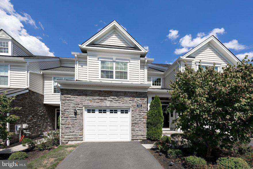 Welcome to a stunning and elegant 3-bedroom, 3.5-bath, 1st-floor main bedroom, finished walk-out basement with a full bath, situated in the highly sought-after Oaks at Lafayette Hill community. Ready to Move in! This impressive 2,430 sq. ft. home seamlessly blends style, comfort, and convenience. Enter the foyer and instantly experience the spacious and inviting open floor plan, accentuated by Mannington engineered hardwood floors throughout the main floors and recessed lighting that seamlessly flows throughout. The open kitchen serves as the heart of the home, showcasing impressive 42-inch cabinetry, a stylish tile backsplash, and elegantly rounded-edge granite countertops that enhance its appeal. The spacious center island, complete with a granite top, provides ample prep space and features a double-bowl sink that enhances both functionality and seating options. The adjacent great room boasts ample space for gatherings with loved ones, complete with sliding glass doors that extend to a composite deck, perfect for entertaining, enjoying a peaceful moment, or grilling outdoors. The dining area is flooded with natural light, making it an ideal setting for both casual meals and elegant dinner parties. 1st floor primary suite, boasting a walk-in closet, recessed lighting, crown molding, and large windows that flood the space with natural light. The ensuite primary bath features a stylish 12x12 tiled floor, a double vanity, a walk-in shower, and a convenient linen closet. The main level features a laundry room for ultimate convenience, complemented by a conveniently placed powder room and a practical coat closet. The impressive hardwood stairs lead to the upper level, which offers a view of the main level area. The versatile upper open loft area is perfect for an office space, a creative art studio, or even a piano nook. Two generously sized bedrooms offer ample closet space, while the full hall bath features a double vanity and a convenient, practical shower/tub combination. The finished walk-out basement with full bath offers versatile living spaces that can be used as a spacious family room or a flexible bonus room, perfect for a media or game room, playroom, home office, in-law suite, or gym. This home offers a convenient location with easy access to major highways, including 76, 476, 309, and 202, as well as the PA Turnpike, beautiful parks, and the vibrant local scene in downtown Conshohocken. Don’t miss your chance to own this beautiful home in a highly desirable neighborhood! Move-in condition! Easy to Show!