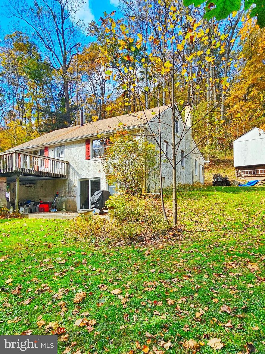 Hunters and  Fisherman alert! Did you ever say I want to live in the woods, by a creek?  Here it is, 5BR 2 BA cape with a finished walk out basement.  There is a wrap around deck on the house to sit and enjoy the sounds of your own Class A trout stream.  Inside you will find  a family room addition with vaulted ceilings updated kitchen with a  butcher block island, A formal Living room with a Wood stove and door to the deck.  You will find 2 nice sized Bedrooms and a full bath on the 1st floor. 2nd floor has two Bedrooms. There is a separate entrance to basement and it includes a Living Room, Kitchen, full bath and a bedroom.  Weekend appointments only.