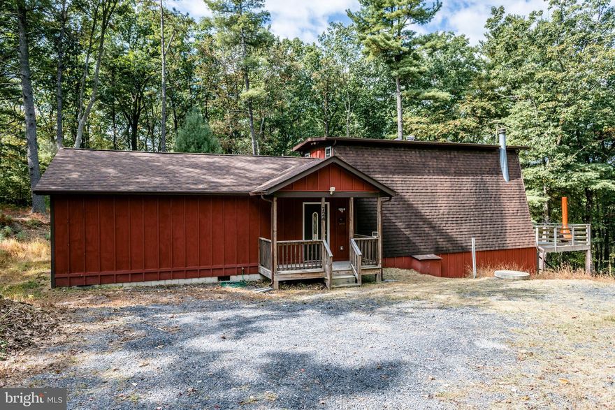 Mountain cabin/ lodge perfect for primary residence or second home getaway consisting of 3 bedrooms, 2 full baths.  Completely remodeled in 2013 with beautiful bamboo floors, double pane windows, updated electric and plumbing throughout the entire cabin and remodeled kitchen.  Large deck for entertaining. New septic line to the septic tank.  Excellent insulation throughout the cabin. New well pump and pressure tanks.   Only 10-15 minutes from Bryce Resort .  Come to your Mountain Retreat to rest and relax. Furniture is included in the sale.   Crawl Space under the addition is encapsulated and has a dehumidifier.