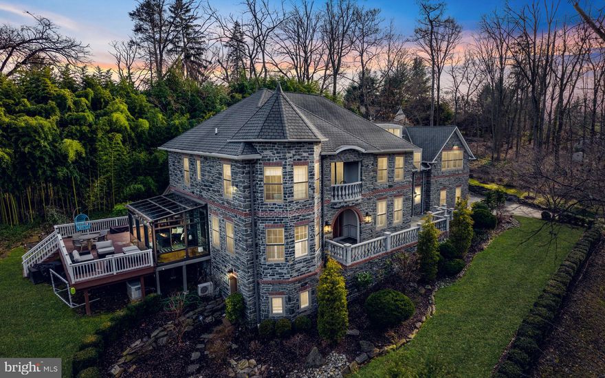 Recently purchased, the new owners saw to meaningful and comprehensive updates and renovations to what was already and beautiful home. Dramatic 2 story foyer opens to the living room, made family friendly with a projector and access to a three-season screened and glassed eastern facing solarium. The volume ceiling continues into a stunning family room with fireplace flanked by custom shelving and brightened by an oversized window. This gathering space flows into the breakfast room with wide upholstered window seat and steps away to a chic and newly updated kitchen. Pulled from the pages of a design magazine, crisp, white cabinets surround a large, seated quartzite center island with matching slab backsplash and gold hardware. More updates to the home include a renovated butlers pantry adjacent to the dining room and a large office on this first level customized with a wall of shelving for display, and storage. Ascend one of 2 staircases to 4 bedrooms each with en-suite bath. The primary bedroom is a suite into itself. A sitting area and large bedroom share the warmth and sophistication from a double-sided fireplace. The primary bath, a true spa experience, and only recently completed, pairs white oak cabinetry, with striking large format tile, a deep free standing soaking tub, large, and seated shower. The third level offers a second large office, ideally located for privacy. A resort quality lower level, with exits to a stone path leading to the gardens and flat yard. Handsome tiled floors laid in a herringbone pattern add warmth and practicality…and entertaining kitchen, recreation area and gym which has functioned as the additional 5th bedroom along with a large bath completed this level.
Other things to know about this home…There is an outfitted pantry just off the kitchen.
Large mudroom
Oversized and expanded height garage. 
2 powder rooms
Second level Laundry Room  with two, full size, washers and dryers and LG Styler Steam Closet
Stunning updated lighting on both the interior and exterior of the home
Located in Black Rock Middle School Boundary.....
 
Turnkey, pristine and beautifully styled