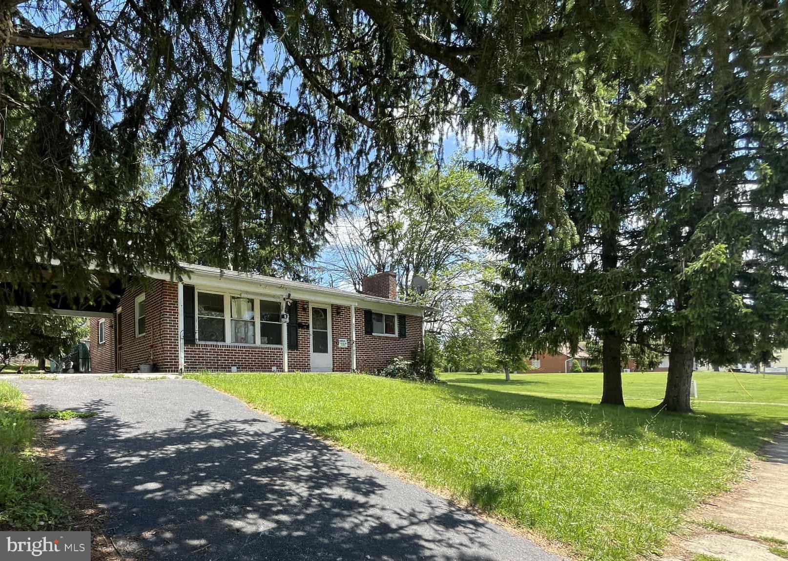 All-brick 3-bed, 2-bath rancher on beautiful .18 acre lot with shed and mature trees just steps to downtown Historic Martinsburg. Handsome hardwoods in living room and upstairs bedrooms. New vinyl plank flooring in spacious, sunny kitchen. Gas fireplace in family room. Downstairs bedroom and full bath with laundry and separate entrance provides perfect set-up for in-law suite or apartment. Carport offers convenient off-street parking or patio entertaining. Furnace newly installed this year! Convenient to shopping, restaurants, parks, and community recreation. Just 5 minutes to I-81 and Martinsburg MARC Train station (perfect for commuting to Maryland/DC-area). Less than 15 minutes to Historic Shepherdstown restaurants, shops and university. Short drive to Winchester VA, Hagerstown, MD, Historic Berkeley Springs, WV. Abundant fishing, hunting, and recreation opportunities in nearby Harpers Ferry and scenic mountains of West Virginia's Eastern Panhandle. Expected on-market date is August 15 or sooner.