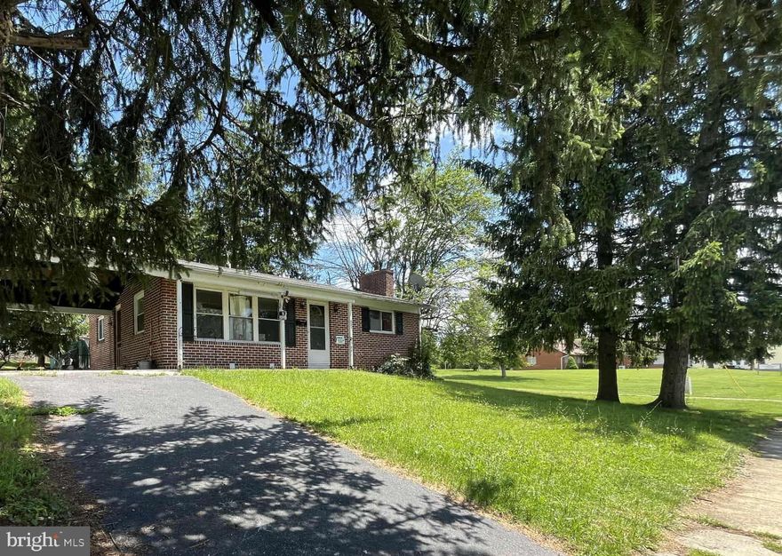 Back on market; contract fell through due to buyer financing issues. All-brick 3-bed, 2-bath rancher on beautiful .18 acre lot with shed and mature trees just steps to downtown Historic Martinsburg. Handsome hardwoods in living room and upstairs bedrooms. New vinyl plank flooring in spacious, sunny kitchen. Gas fireplace in family room. Downstairs bedroom and full bath with laundry and separate entrance provides perfect set-up for in-law suite or apartment. Carport offers convenient off-street parking or patio entertaining. Furnace newly installed this year! Convenient to shopping, restaurants, parks, and community recreation. Just 5 minutes to I-81 and Martinsburg MARC Train station (perfect for commuting to Maryland/DC-area). Less than 15 minutes to Historic Shepherdstown restaurants, shops and university. Short drive to Winchester VA, Hagerstown, MD, Historic Berkeley Springs, WV. Abundant fishing, hunting, and recreation opportunities in nearby Harpers Ferry and scenic mountains of West Virginia's Eastern Panhandle. Expected on-market date is August 15 or sooner.
