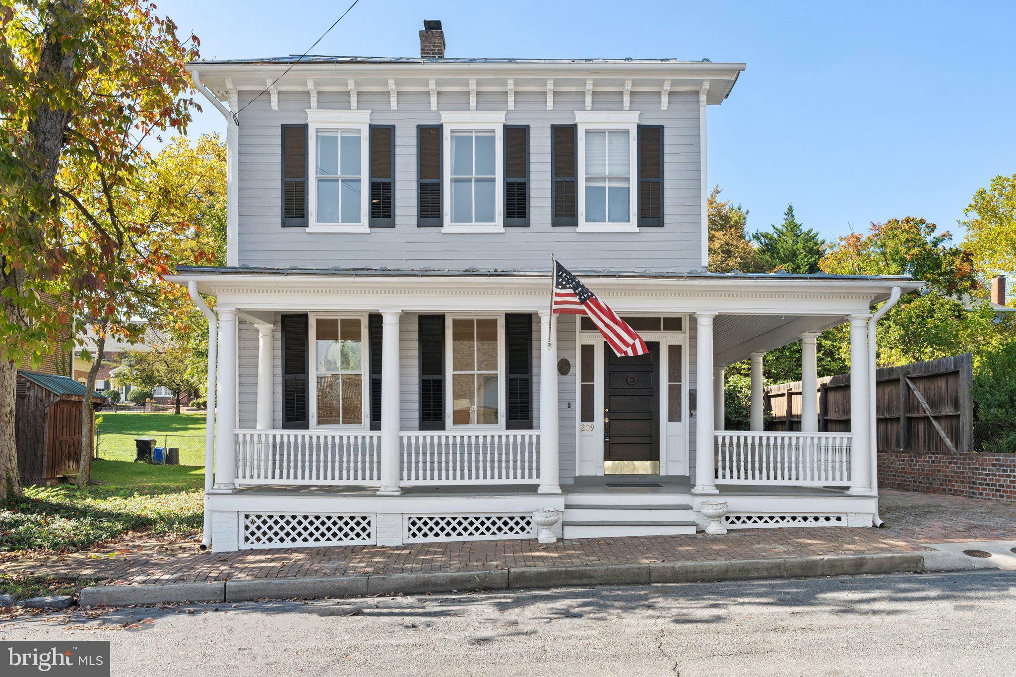 Live in the heart of historic Winchester! This beautifully maintained 1853 home on Washington Street offers more than just a place to live—it’s a lifestyle. With over 3,000 square feet of finished space, this one-of-a-kind rental blends timeless character with modern updates just blocks from the Old Town Walking Mall and steps from the Apple Blossom Parade Route.
Inside, you’ll find 10-foot ceilings, original hardwood floors, oversized rooms, and stunning 19th-century craftsmanship throughout—from the intricate moldings to the restored hardware. The spacious layout includes 4 large bedrooms, including a primary suite with a huge walk-in closet, and 3 full bathrooms thoughtfully placed throughout the home.
Enjoy morning coffee on the charming wraparound porch or host friends in your private backyard retreat. The home also features off-street parking and both front and rear staircases.
Recent updates include freshly painted siding, windows, and shutters in 2023. The original windows have been reglazed, the metal roof has been painted, and the front porch has been restored. Within the past two years, the electric panel has been upgraded to a new 200-amp service, and both a new boiler and water heater have been installed—offering peace of mind and comfort.
Downtown Winchester’s best shopping, dining, and entertainment are just a short stroll away. Come experience the charm and convenience of in-town living. No smoking on the property.