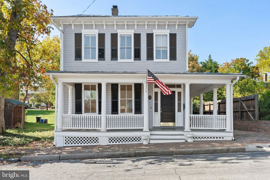 Live in the heart of historic Winchester! This beautifully maintained 1853 home on Washington Street offers more than just a place to live—it’s a lifestyle. With over 3,000 square feet of finished space, this one-of-a-kind rental blends timeless character with modern updates just blocks from the Old Town Walking Mall and steps from the Apple Blossom Parade Route.

Inside, you’ll find 10-foot ceilings, original hardwood floors, oversized rooms, and stunning 19th-century craftsmanship throughout—from the intricate moldings to the restored hardware. The spacious layout includes 4 large bedrooms, including a primary suite with a huge walk-in closet, and 3 full bathrooms thoughtfully placed throughout the home.

Enjoy morning coffee on the charming wraparound porch or host friends in your private backyard retreat. The home also features off-street parking and both front and rear staircases.

Recent updates include freshly painted siding, windows, and shutters in 2023. The original windows have been reglazed, the metal roof has been painted, and the front porch has been restored. Within the past two years, the electric panel has been upgraded to a new 200-amp service, and both a new boiler and water heater have been installed—offering peace of mind and comfort.

Downtown Winchester’s best shopping, dining, and entertainment are just a short stroll away. Come experience the charm and convenience of in-town living. No smoking on the property.