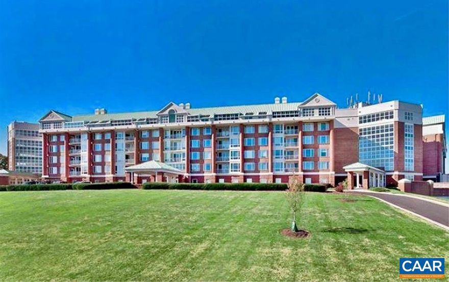 UNIVERSITY VILLAGE in beautiful Charlottesville. Just minutes to all things UVA, shopping in Stonefield and strolling on the Downtown Mall. This 1st floor condo offers a great floor plan with foyer, dining room, great room, office, kitchen with breakfast nook, laundry/mechanical room, 2 bedrooms and 2 full baths. Primary suite enjoys 2 walk-in closets, radiant heat floor in bath featuring double vanity, walk-in shower plus a walk-in tub. Covered porch (with gate) overlooking lovely mature landscaping. This 55+ community offers many amenities such as an indoor pool, exercise room, library, organized activities, and so much more. This condo comes with 1 designated parking space in underground garage and elevator access to all floors (elevator is key accessible only for added security). Utilities included.