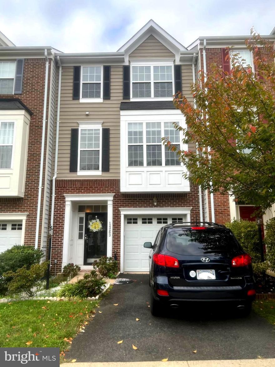 Welcome to the highly sought out Crossroads Village community! This hard to find opportunity features a massive master bedroom and is accompanied by 2 spacious bedrooms all on the upper level. The master boasts a luxurious soaking tub with a walk-in shower as well as a double sink all coated in natural light. 
On the main level you'll have your main living room, dining area and a kitchen ready to be filled with memories, laughs and love with the upcoming holiday season. Every inch of this home gets graced with natural light thanks to the large windows surrounding the main level area! The main level also has access to the large patio where you'll be able to enjoy the green-filled scenery you'll be surrounded by. 
Lastly, the lower level has a seperate flex space that can be utilized as a living room/office/workout area! The lower level has the laundry room, main entrance, garage and even a half bath! Plenty of parking for families with 2 or 3 cars! Do not let this opportunity pass you by, this home won't be on the market long!

**Furniture besides the bed in master bedroom may be purchased or leased**