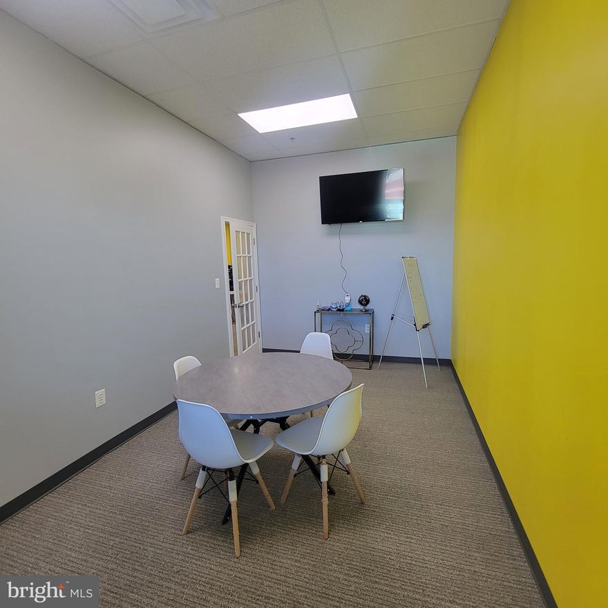 Great opportunity to rent large private office with space for sitting area or 2 offices located in busy real estate office in busy shopping center. Rent includes furniture, use of conference rooms during weekdays, internet, electricity, and kitchenette. Ideal for professional business (i.e. administrative, therapy, notary, clerk). Short-term lease (6 months) available for initial term, up to 12 months available at renewal.