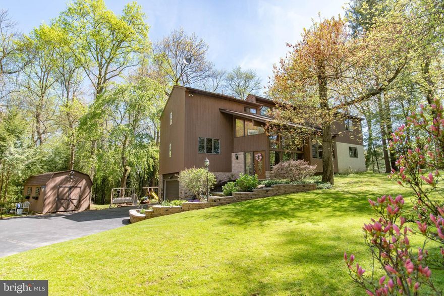 Video Tour - https://youtu.be/LU_J75mLjzM - Charming & unique, welcome to your 1 of a kind custom built home Southampton Bucks County! Come see this contemporary beauty on a private cul-de-sac surrounded by trees & nestled in a private setting that is hard to find. This outstanding location backs up to a 5 acre wooded area with views overlooking a beautiful large pond. Enjoy the outdoors from one of your 3 decks, or in the yard which offers a built in Jacuzzi tub. As you pull up to the home, the care sellers have taken is evident. Carefully landscaped stone stairway leads to your impressive front door   inside you will find: 2 story foyer, open floating staircase, large windows to let in natural light thru out, cathedral ceilings with wood beams, main level bedroom and full bath, fireplace in the living room and wood stove in the lower level family room. Complete with 4 beds & 3.5 baths, this open floor plan will please!  So many special details are here for you to enjoy. Schedule your Virtual Tour today.