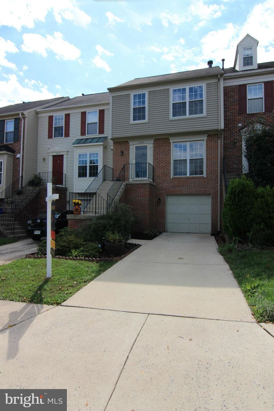 Beautiful, move-in ready, 3 level, 3 bd, 2 full/2 half baths, brick front, garage, Italian tile in kitchen, hardwood on main level, cozy family room w/fp, fully finished basement, fenced yard, deck off main level, backyard patio & garage complete this home.  Easy access to shopping & major commuter routes(I-66, 28, 29, Park & Ride, Bus to Vienna Metro). Great price: won't disappoint!