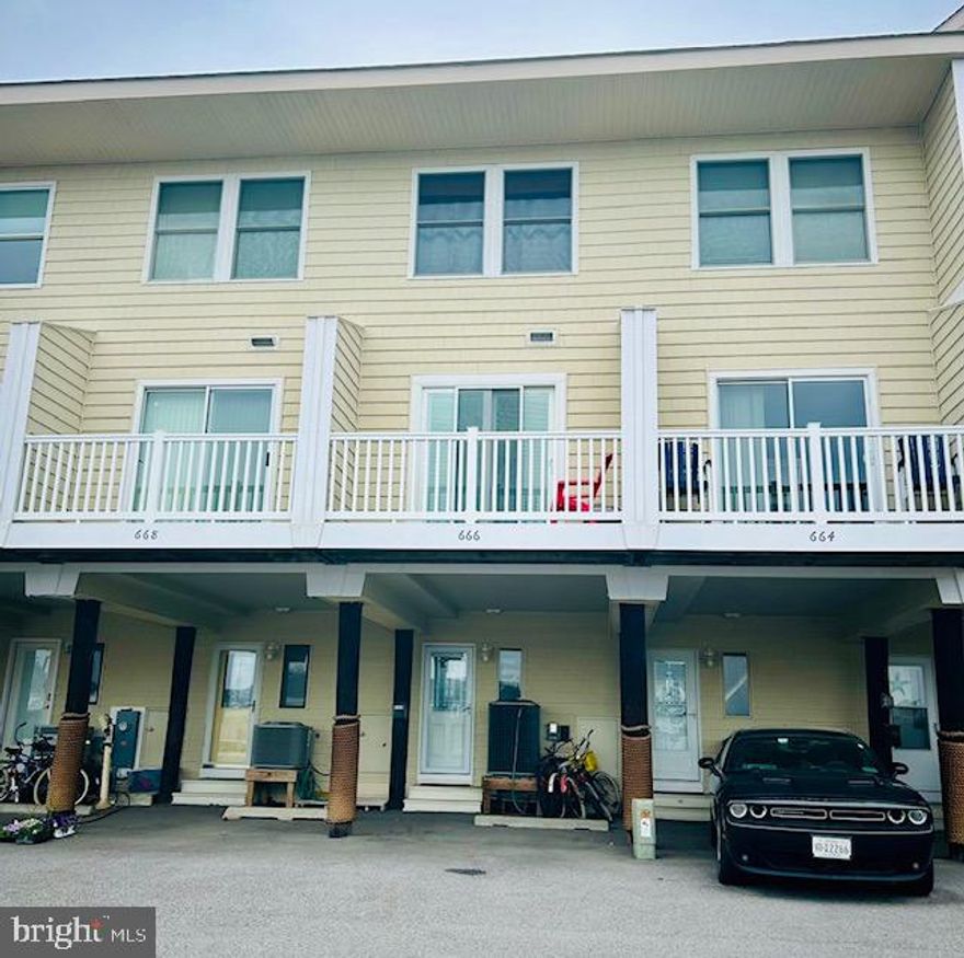 Welcome to coastal living at its finest in the highly sought-after Casa Del Sol community! This remarkable three-bedroom townhome offers a rare opportunity to own a piece of bayfront paradise in one of the most desirable locations along the coast.

Location, location, location! Don't miss out on this exceptional offering, as townhomes in Casa Del Sol are a rare find and always in high demand. Boasting unrestricted views overlooking the marsh and bay, prepare to be mesmerized by the stunning sunsets and vibrant firework displays from nearby Northside Park. Embark on adventures only bayfront living can offer with private use of the community owned dock and boat slip allowing easy access to the bay. The canal is perfect for long kayak rides through the pathways in the marsh, paddleboarding, crabbing, or simply enjoying the serene surroundings.

Indulge in the tranquility of coastal living as you relax on your back deck or porch, soaking in the sights and sounds of the marsh wildlife, from graceful birds to playful otters. This prime location offers a short walk to a wealth of amenities, including the beach, great restaurants, grocery store, dog park, tennis and basketball courts, and so much more, ensuring convenience and entertainment at your fingertips.

Step inside to the interior and let your imagination create your vision of the perfect coastal retreat. The first level welcomes you with ceramic tiled floors, leading to a renovated full bath and a spacious third bedroom or versatile rec room should a sofa bed be your preference for utilizing this great space. This large space is ideal for accommodating guests or creating a cozy retreat.

Ascend to the second floor, where gleaming hardwood floors guide you to the heart of the home. The expansive living room beckons with its breathtaking views and access to the back porch, the perfect spot to savor your morning coffee or unwind after a day of adventure. The recently updated kitchen steals the show with its white shaker cabinets, stainless steel appliances, granite countertops, and convenient full sized stackable washer/dryer, offering both style and functionality. There is also a slider in the kitchen leading to the front porch for yet another great spot to unwind and do some people watching.

Continue to the upper bedroom level, where two well-appointed bedrooms await. The larger of the two bedrooms offers ample space for accommodating guests or creating a cozy retreat, while the primary bedroom boasts panoramic bay views and a serene ambiance. Each newly carpeted bedroom is complemented by a renovated full bath, ensuring comfort and convenience for all. 

One thing to note about this great home is that there is no paneling as is very common in these units, and the owners have recently replaced all 3 sliding doors. In addition, enjoy the added convenience of parking right outside your front door, with an additional parking space allotted to each unit.

Don't miss your chance to own a slice of paradise in the Casa Del Sol community. Schedule you're showing today and discover the best of coastal living in this fabulous bayfront townhome!  *Being sold furnished*