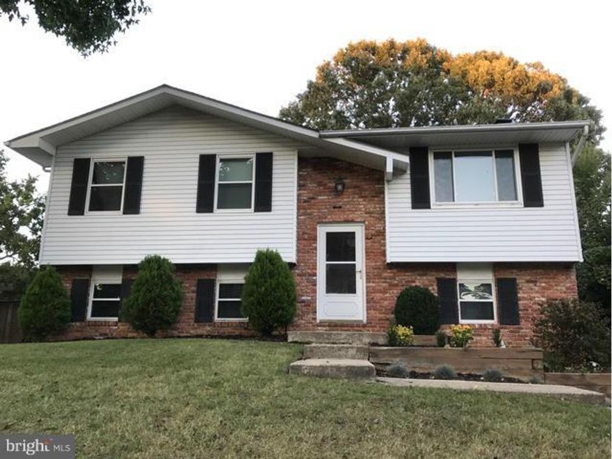 Beautiful home is situated on a cul-de-sac in a Blue Ribbon Elementary School District!  Boasts kitchen with breakfast bar, separate dining room, large living room, 2 baths & 3 bedrooms including large owner's bedroom with private bath. Large lower level with family room and large bedroom with brick wall fireplace & sliders that open to patio and in-ground pool!