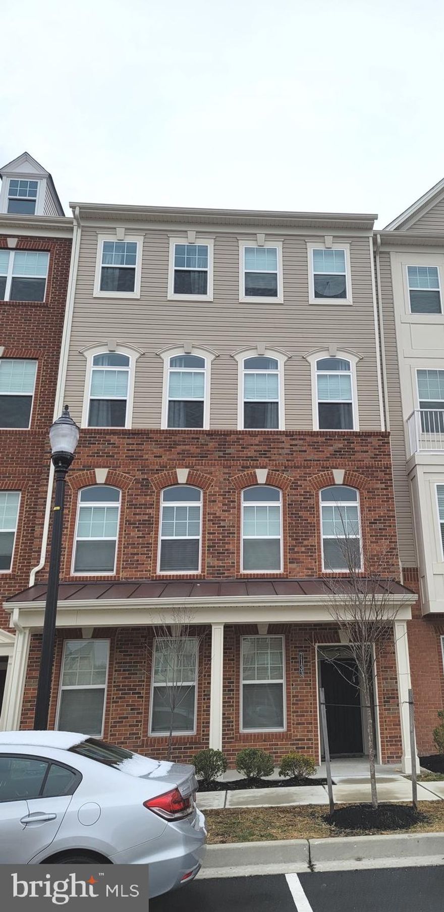 Come see this beautiful town home unit in Oxford Square! Howard County Schools! Private garage parking and a PRIVATE ELEVATOR to the unit. Beautiful chocolate LVP flooring throughout the first level. Plenty of entertaining space with an open concept and upgraded gourmet kitchen. Well appointed primary bedroom with a walk in closet and spacious en suite! In unit laundry with front load washer and dryer located on the bedroom level. 1 block away from the community clubhouse. Less than 1 block from neighborhood schools. Come see this beauty in person!