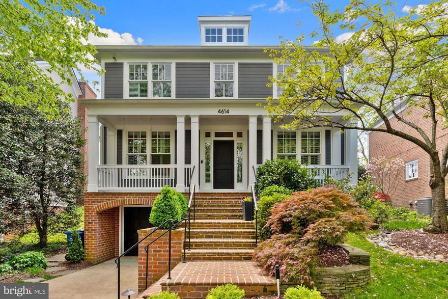 Breathtaking river views from this stunning four bedroom, three and a half bathroom home nestled in an ultra convenient location make this property one of a kind. Fully updated and with a modern floorplan, this turnkey residence has hardwood floors, crown moldings, recessed lighting and countless other features. The main level boasts a gourmet kitchen with a suite of stainless steel appliances, ample cabinet and counter space and a breakfast nook. Just off of the kitchen is the sun drenched family room which has a fireplace and offers access to the terrace and yard which enjoy commanding views of the Potomac River. The living room is large and open with multiple windows providing light from two exposures. The dining room is well proportioned and  perfect for entertaining. A stylish powder room discreetly located off of the entry hall rounds out this level. The upper level contains the large primary bedroom suite with a large walk-in closet, generous bathroom with a free standing tub and windows throughout providing natural light and gorgeous nature vistas. The second and third bedrooms are both generous in size and have spacious closets. The hall bath is tastefully updated. The lower level has a large den/media room with a fireplace, bedroom with a  sizeable closet, functional laundry room and access to the garage with added storage. With a location that offers a multitude of walking options, easy access to downtown Washington as well as Virgina and Maryland and  inspired views, this exceptional home is not to be missed.