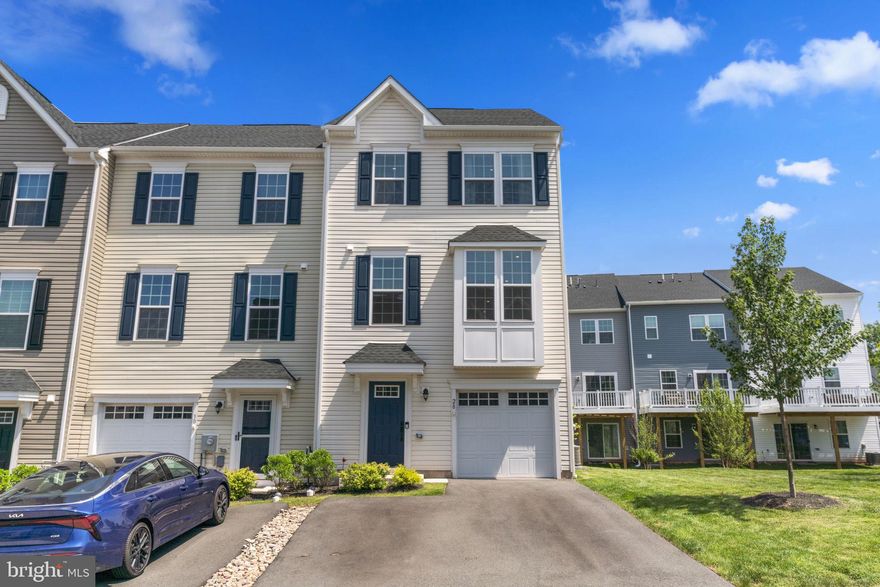 Just Like New! Gorgeous End-Unit Townhome in Foxwood Ridge. Welcome to 28 Boot Ln—a beautifully maintained, two-year-young end-unit townhome located in the sought-after Foxwood Ridge Community. Offering the perfect blend of modern elegance and everyday convenience, this home is move-in ready and full of upgrades. Step inside to a welcoming foyer with two spacious closets and direct access to a cozy, versatile lower-level living space—ideal as a family room, home office, or entertainment area. Upstairs, you’ll be impressed by the stunning kitchen featuring sleek quartz countertops, bright white cabinetry, and durable LVP flooring. Whether you're enjoying a quiet meal or entertaining guests, the open-concept kitchen and dining area is perfectly designed for both comfort and style. A sliding glass door leads to a brand-new Trex deck—perfect for outdoor dining and summer BBQs. The open flow continues into the main living room, complete with soaring 9-foot ceilings and a 2-foot front bump-out that adds extra space and natural light. You'll love the upgraded lighting package, which enhances the modern aesthetic throughout the home. A convenient powder room rounds out this level. Upstairs, plush newer carpeting leads you to three spacious bedrooms, including a serene primary suite with a dramatic tray ceiling, upgraded lighting, a walk-in closet, and a private en-suite bath. Two additional bedrooms, a stylish full bathroom, and a second-floor laundry room offer comfort and convenience for the whole family. Additional highlights include a one-car garage, a two-car driveway, and easy access to Routes 100 and 422—making commuting a breeze. Don’t miss your opportunity to own this stunning, move-in-ready home in a fantastic location. Schedule your showing today!