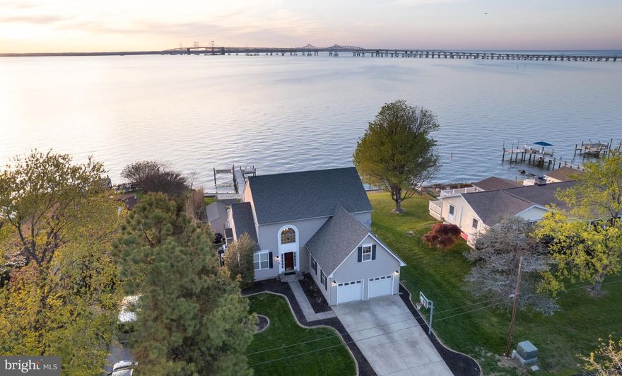 Bayfront Paradise in Bay City – Stevensville, MD

Welcome to your waterfront dream home in the sought-after Bay City neighborhood of Stevensville. Just 5 minutes off of Route 50, this stunning 3,115 SQFT residence offers the ultimate Chesapeake Bay lifestyle with sweeping, unobstructed views of the Bay and the iconic Bay Bridge.  

Enjoy resort-style living right in your own backyard—complete with a private beach, an in-ground pool and hot tub, and your very own artificial turf putting green. 

For the boating enthusiast, the private pier features a  boat slip and Jet Ski lift, with excellent fishing right off the dock. Rockfish, perch, spot, croaker, and red drum are caught in abundance. Launch your kayak and paddleboard directly from your backyard, exploring the tranquil waters of the bay at your leisure.

Inside, the home features an open and airy layout, designed for both entertaining and relaxation. The 5 spacious bedrooms provide ample room for family and guests, while the 3.5 bathrooms ensure convenience and comfort for everyone. Large glass windows throughout the home provide HUGE views of the bay, and breathtaking sunsets each evening. 

Don’t miss your chance to own one of the most exceptional waterfront properties on Kent Island.