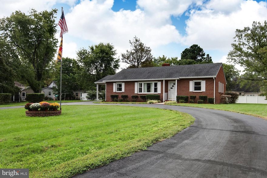 Beautiful Brick Rambler in Leonardtown!  Original Hardwood Floors throughout!  Kitchen updated lat year which includes all new stainless steel appliances, new cabinets, dura ceramic flooring and Quartz Countertops.  Other recent updates include new oil boiler, heat pump, air handler and oil tank.  Could potentially subdivide into 2 lots, land on corner with white fence is included!  Don't miss out!!!