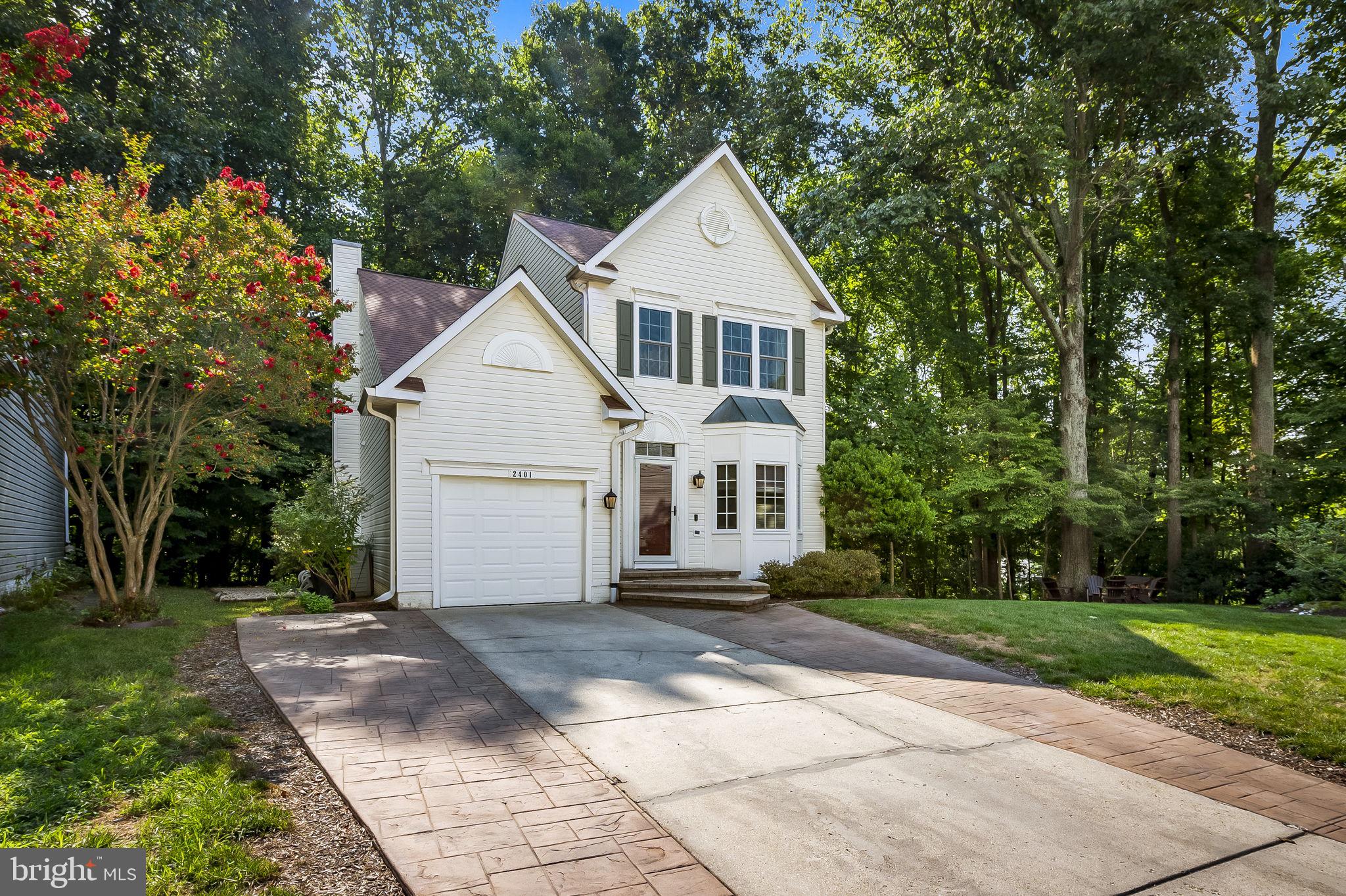 Welcome to this beautiful single-family home in the desirable Walden community of Crofton, MD. Newly painted and move-in ready, this home offers 3 bedrooms, 3.5 bathrooms, and the potential for a 4th bedroom in the fully remodeled basement, combining comfort and modern convenience.
The kitchen features granite countertops, white cabinetry, and stainless steel appliances, ideal for any home chef. The spacious dining room is perfect for gatherings, while the living room boasts custom built-in shelving and a cozy natural gas fireplace. A convenient half bathroom on the main floor serves guests.
The remodeled basement includes a full bathroom and laundry room, providing additional space for relaxation or an extra bedroom. The attached one-car garage offers ample storage and includes an electric vehicle charger receptacle.
The master suite features a walk-in closet and an updated en suite bathroom with stylish new tile work. Located in the vibrant Walden community, residents enjoy amenities such as a swim and tennis club, a competitive swim team, tot lots, playgrounds, and a network of scenic trails. This home offers a perfect blend of comfort and convenience—don’t miss the chance to make it your own!