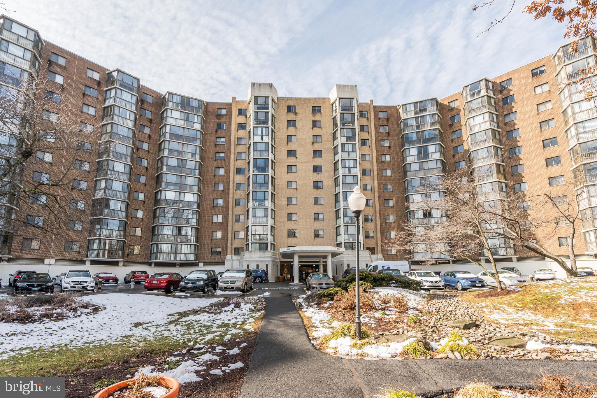 Location, location, location! Discover your dream home in the sought-after Leisure World community at The Greens, 15101 Interlachen Drive, Unit 1918, Silver Spring, MD. This popular and rarely available "K" model offers an impressive 1,520 square feet of living space with breathtaking golf course and tree views from every window.
Step into this move-in ready condo featuring 2 spacious bedrooms and 2 bathrooms, complemented by a large den/home office and sunroom, perfect for relaxation or productivity. The kitchen boasts an eat-in area and a sizable walk-in pantry. The owner's suite is designed with both a walk-in and mirrored closet, a charming vanity area, and a step-in shower. Enjoy the luxury of a private exit that leads directly to the sunroom. An oversized secondary bedroom/office provides ample storage with additional closets and a built-in bookcase.
Residents will appreciate the personal storage area (#60), a convenient storage cage. Proximity to elevators ensures smooth transitions with groceries and access to the community's many amenities.
Leisure World's 55+ community offers an abundance of indoor and outdoor activities, including access to fitness centers, clubhouses, restaurants, tennis courts, walking/jogging trails, and an outdoor pool. Memberships are available for the indoor pool and on-site golf course. From scheduled dances, dinners, and movie nights to various social events, this vibrant community ensures there's never a dull moment.
Experience peace of mind in this gated community with grocery stores, restaurants, a post office, and more just beyond the gates. The unit is being sold "AS IS," presenting an incredible opportunity for its new owner to enjoy all these features and more. Don't miss out on making this exceptional property your new home!