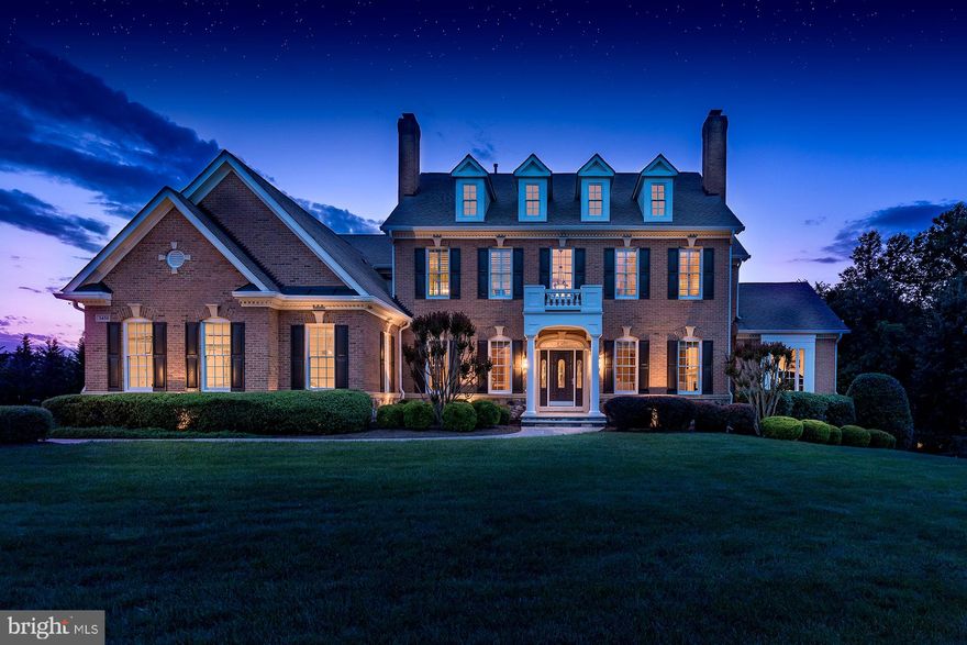 Stunning brick and stone colonial custom home on a premium .88 acre lot and quiet cul-de-sac. Three finished levels of elegant sun filled open concept living with exquisite finishes throughout. Including 6 bedrooms, 6 full baths, 4 fireplaces, and a grand two story foyer. Incredible chef's kitchen with center island, sub zero refrigerator, sub zero freezer, high end appliances, butler s pantry with wet bar, and breakfast room. Owner s retreat with spa-like bath, sitting room and dual walk-in custom closets. Private yard with landscaping, covered deck, patio and fire pit. Peace and tranquility minutes from everything.