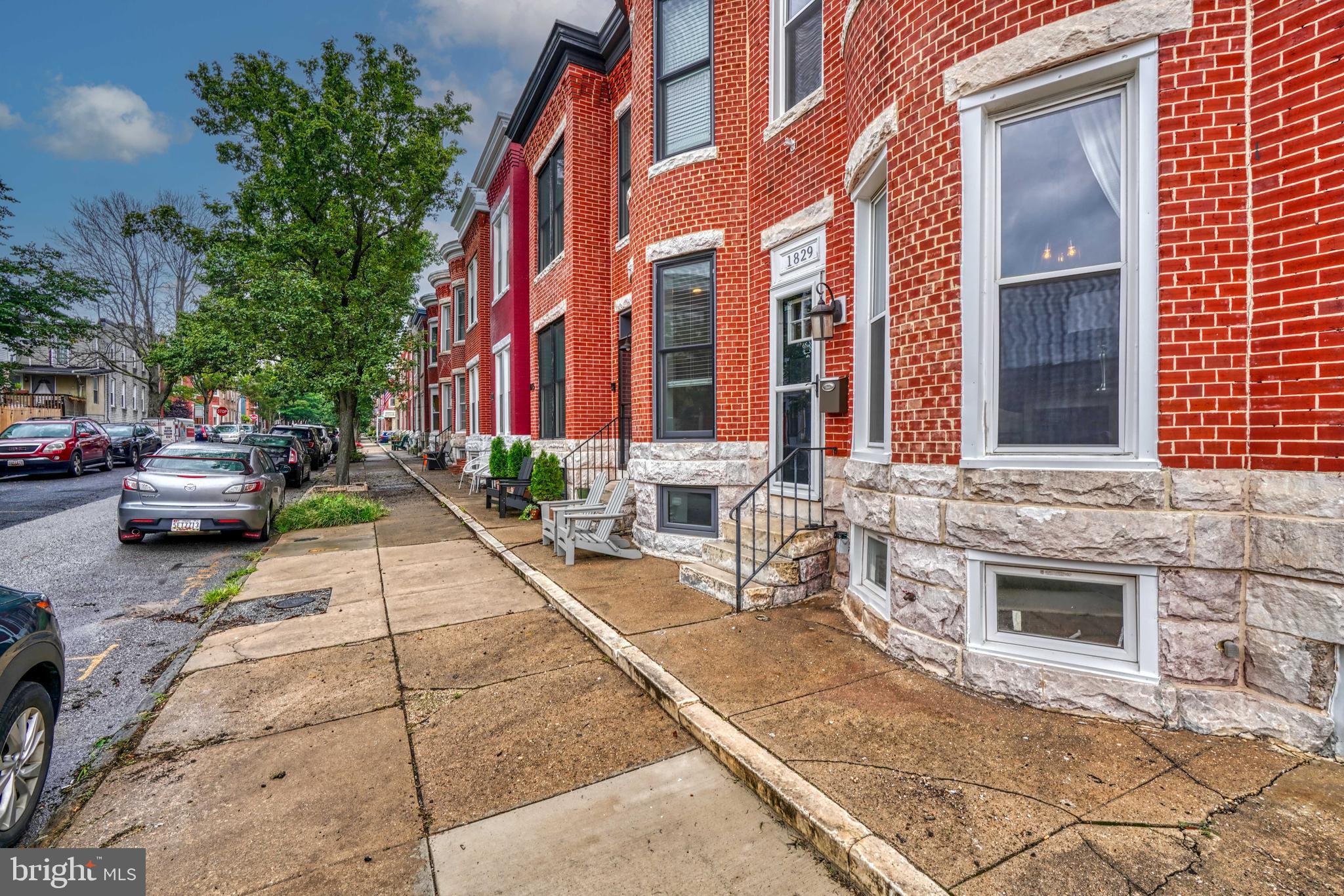 Recently renovated, this Riverside charmer is sure to please and is also located on one of the neighborhoods most desirable blocks. One block from Riverside Park, this street is filled with so much character and coziness to call home! This end of row house, dead end street, offers less traffic and more privacy along with a parking pad in the rear. Enter into the main level floor you will find a front bay window, gleaming hardwood floors through out, exposed brick wall in the living room, and recessed lighting. both full bathrooms upstairs have been fully renovated with high end tile/finishes. At last, enjoy relaxing on the brand new roof top deck.