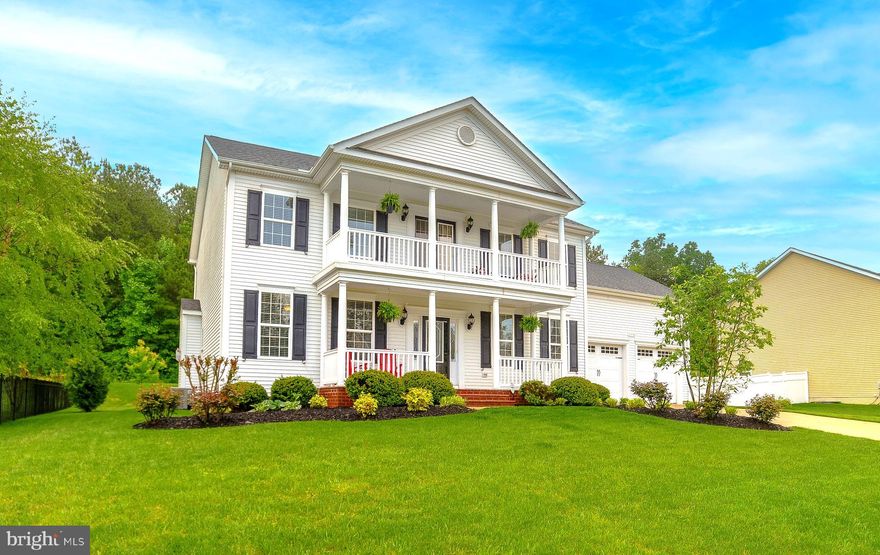This gorgeous Leonard's Grant Colonial has it all - including double front porches! Cross the welcoming front porch and enter this 5 bedroom, 3.5 bath home where the attention to detail shines through. Lustrous hardwoods, 9' ceilings, crown moulding, chair rails, shadow box wainscot and wrought iron stair rails are just a few of the design touches that separate this home from others. The spacious layout has room for everyone, including a formal dining room, formal living room or dedicated home office, open-concept kitchen, dining area and family room with gas fireplace. The kitchen features upgraded hardwood cabinetry, granite counters, a big island, stainless appliances, pantry and double wall ovens. Enjoy outdoor living on the back deck that overlooks the woods and open space behind. Primary ensuite has a vaulted ceiling, walk-in closet and bath with roomy tile shower, separate soaking tub and double vanities. While you're upstairs, step out and take in a breath of fresh air on the upper balcony. The fully finished lower level includes the 5th bedroom, a full bath,  sliders to the backyard, a home theater/media room and a rec room with pool table that conveys!
Great community amenities, a two car garage, tankless water heater, convenient upstairs laundry, large Amish-made shed and in-ground sprinkler system are additional details that make this impressive home an opportunity not to be missed. Schedule your showing today!