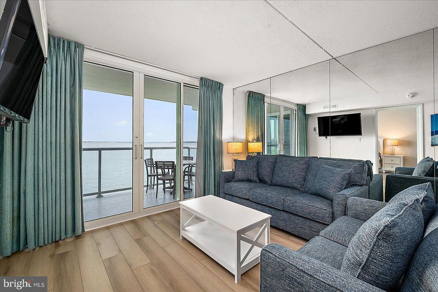 Welcome to your dream coastal retreat! This stunning 3 bedroom, 3 bath condo offers the ultimate in Bayfront living.  Step inside to discover a kitchen boasting solid wood cabinets and sleek granite countertops. The perfect space to cook up your favorite meals with ease.  Featuring a delightful mix of tile and new Luxury Vinyl Plank  flooring, this condo exudes comfort.  Plus, with a full-size washer and dryer conveniently located in-unit, laundry day is a breeze!  The primary bedroom is a true sanctuary, complete with corner windows that flood the room with natural light overlooking the Bay. Open the sliding door and step out onto the balcony to indulge in breathtaking bay views. Imagine waking up to cruise-like vistas and enjoying breakfast in bed. Pure bliss! But that's not all! The building offers an array of amenities including a year-round indoor heated pool for relaxation anytime, and two parking spaces for peace of mind.  With on-site professional management and maintenance, you can rest easy knowing that everything is taken care of. Included in the condo fees are water, sewer,  cable, and internet.  
And let's not forget the recent renovations! New windows and sliding balcony doors, the lobby, exterior of the building, and the balconies have all been beautifully redone. Don't miss out on the opportunity to experience Bayfront living.  Schedule your viewing today! Waiting on professional pictures.