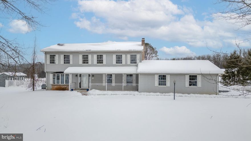 A Warm and Welcoming Place to Call Home. Perfectly situated on a flat and beautiful 1.06-acre lot, this traditional two-story residence offers the space, comfort, and flexibility that make a house truly feel like home. Located in a coveted neighborhood, this property provides both freedom and a peaceful setting to enjoy everyday living. From the moment you arrive, the inviting front porch sets the tone. Inside, the home offers five generously sized bedrooms and three full bathrooms, creating plenty of room for rest, work, hobbies, and hosting guests. The thoughtfully designed layout allows for comfortable gathering spaces while still offering quiet areas for relaxation and privacy. The heart of the home extends outdoors with an expansive rear deck and an in-ground swimming pool, making warm-weather entertaining and everyday enjoyment effortless. A partially finished basement adds valuable additional living space—perfect for a recreation room, play area, home office, or media space—while still offering storage options. The two-car garage provides everyday convenience, and the home’s generous footprint presents wonderful opportunities to personalize and make it your own. Easy access to I-99 and I-80, only minutes away. With its spacious lot, welcoming atmosphere, and versatile living spaces, this home is a special opportunity for those seeking comfort, connection, and space.