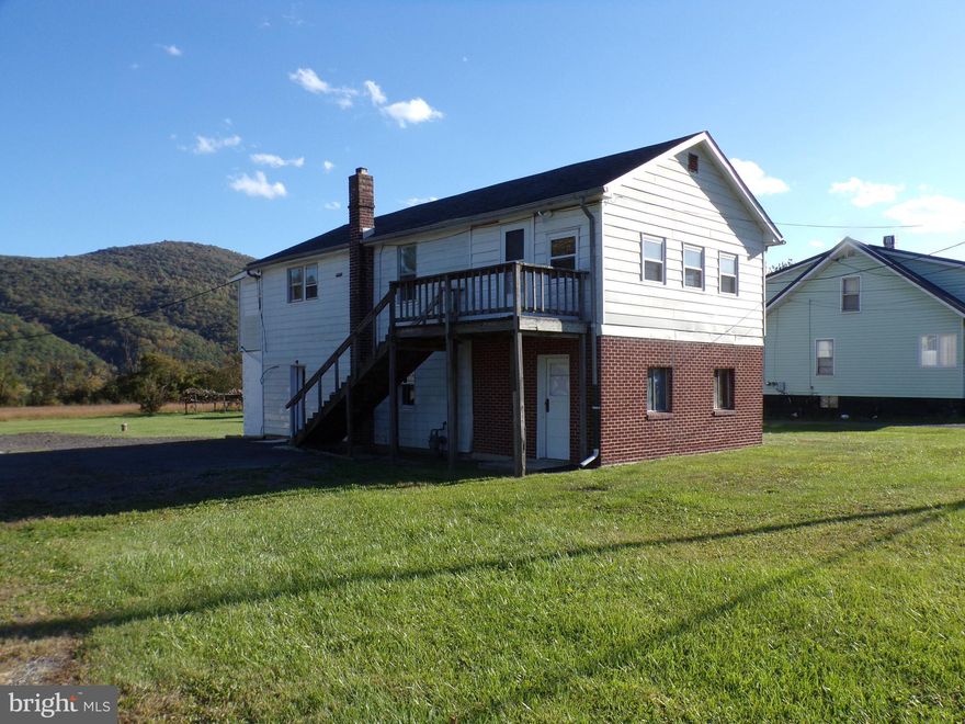 This property is priced to sell, it will not last.  Don't miss the opportunity to own this property.  There are 3 Tax ID's (0.69 acres+-).  The land is absolutely beautiful.  There is a two car detached garage and a one car detached garage and a two story home with lower level partially finished with kitchenette, partial bath and open space.  The second floor has full apartment with kitchen, dining room, living room, two bedrooms, bath and laundry room.  The property has been described as "other" it could be referred to as a raised ranch with partial finished above grade basement or bungalow.  The potential is unlimited, the first floor could easily be completed to be a great first level apartment, the entire dwelling could be converted into single family residence and possible the site could be approved for storage units.