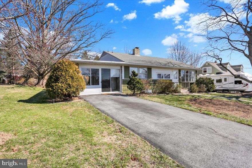 Welcome to this lovely home in St. Lawrence where community parks are near by for your enjoyment. This home has a large sunny 3 season room at the side of the home  . Upon entering you will find that cooking is a breeze in this kitchen which has a breakfast bar, table area and good cabinet and counter space.  There is a spacious living room that boasts original hard wood flooring and a large bow window.  As you go back the hallway there are three nice sized bedrooms all with good closet space.  Your hall bath has tile flooring. Downstairs is the spacious family room with a brick gas fireplace.  There is also a laundry area and a large workshop area.   Another added feature is the floored attic, great for additional storage.  The rear yard with a paver patio is a great place for all of your summer picnics. Welcome Home!