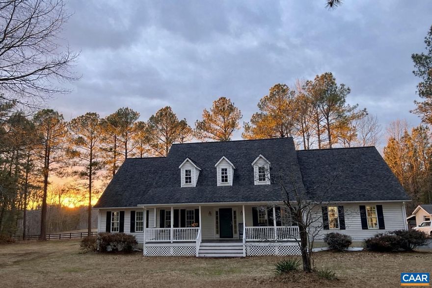 Welcome home to this charming Cape-style residence set on 2 picturesque acres surrounded by mature pines, open pasture views, and beautiful sunsets. Enjoy the perfect balance of privacy and convenience just 31 miles to Charlottesville, 42 miles to Short Pump, 42 miles to Fredericksburg, and under 100 miles to Washington, D.C., making it ideal for commuters or those seeking a peaceful retreat.  A wide covered front porch welcomes you into this thoughtfully updated home offering over 4000 square feet of living space, 7 spacious rooms including two primary bedrooms, and four full bathrooms providing exceptional flexibility for families, guests, or multi-generational living. The property also features a two-car garage and a large third-floor space perfect for storage, hobbies, or additional living area. Recent upgrades include a new roof, refinished hardwood floors, two new HVAC systems, new kitchen cabinets and appliances, and a newly encapsulated crawlspace. A bright sunroom overlooks the pastures, creating a peaceful place to relax. Outside, enjoy a spacious 21? x 22? rear deck, a 20? x 20? workshop/shed, and a 16? x 20? lean-to ideal for storage, equipment, hobbies, or small livestock.