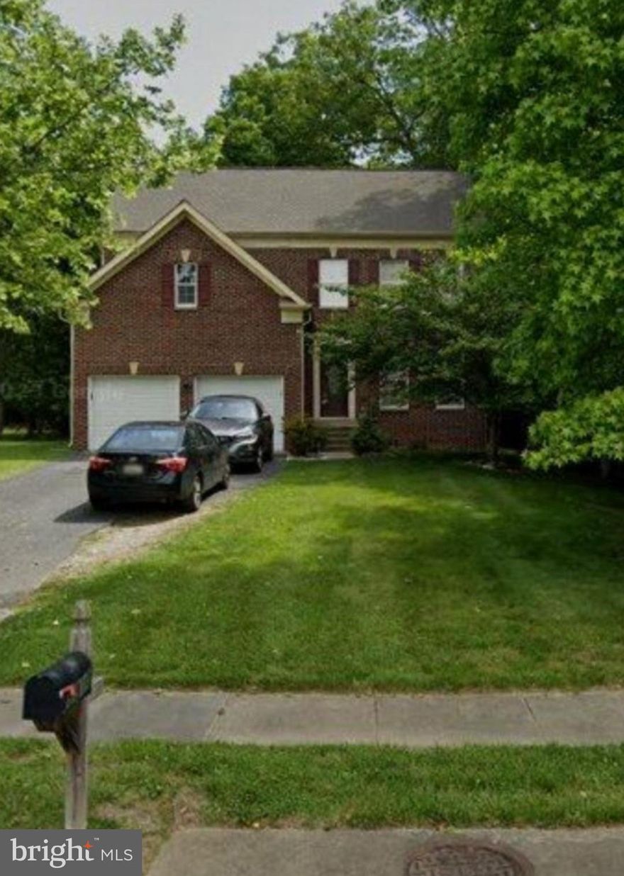 This home is absolutely AMAZING! Neighborhood playground/park.  Attached 2 car garage w/extra-long driveway.  Come on in to see this amazing home.... walk into the large inviting foyer area, with hardwood floors throughout main level, accessing separate living and dining areas moving further into the family room and kitchen area with table space, oversized island, stainless steel appliances and granite countertops, 42' cabinets.  Now, let's check out the backyard oasis backing to trees with built on deck.  While we head upstairs to the sleeping area, we'll view the 4 large bedrooms, including the master bedroom with separate master bathroom, and large walk-in closet.  Total 4 bedrooms and 3.5 bathrooms.  The basement is fully finished with rear exit, large rec room with bar area.  Newer roof (4 years).