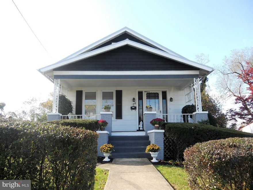 Charming, in town home with a wonderful view of Westminster. Many updates including  fresh coat of paint inside & out, electrical upgrades. Metal roof on house and garage recently scraped, sanded and painted.  Original "real hardwood" floors look great! Spacious & open living room and dining room, super cute, eat -in kitchen.  Main level bedroom and full bath. Large master bedroom, second bedroom & dressing or hobby room on upper level. Really nice, private rear yard with deck/patio. Detached  garage. 1 YR HMS Home Warranty. Relax on the front porch and enjoy the view! Minutes from shopping, restaurants, schools & hospital.  Neat, clean and ready to move in.  Lots of character & very pretty decor.   Come take a look inside, call today for a tour.